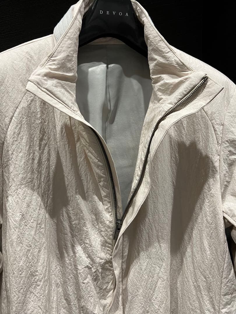 Devoa Salt-Washed Nylon Blend Coat — label