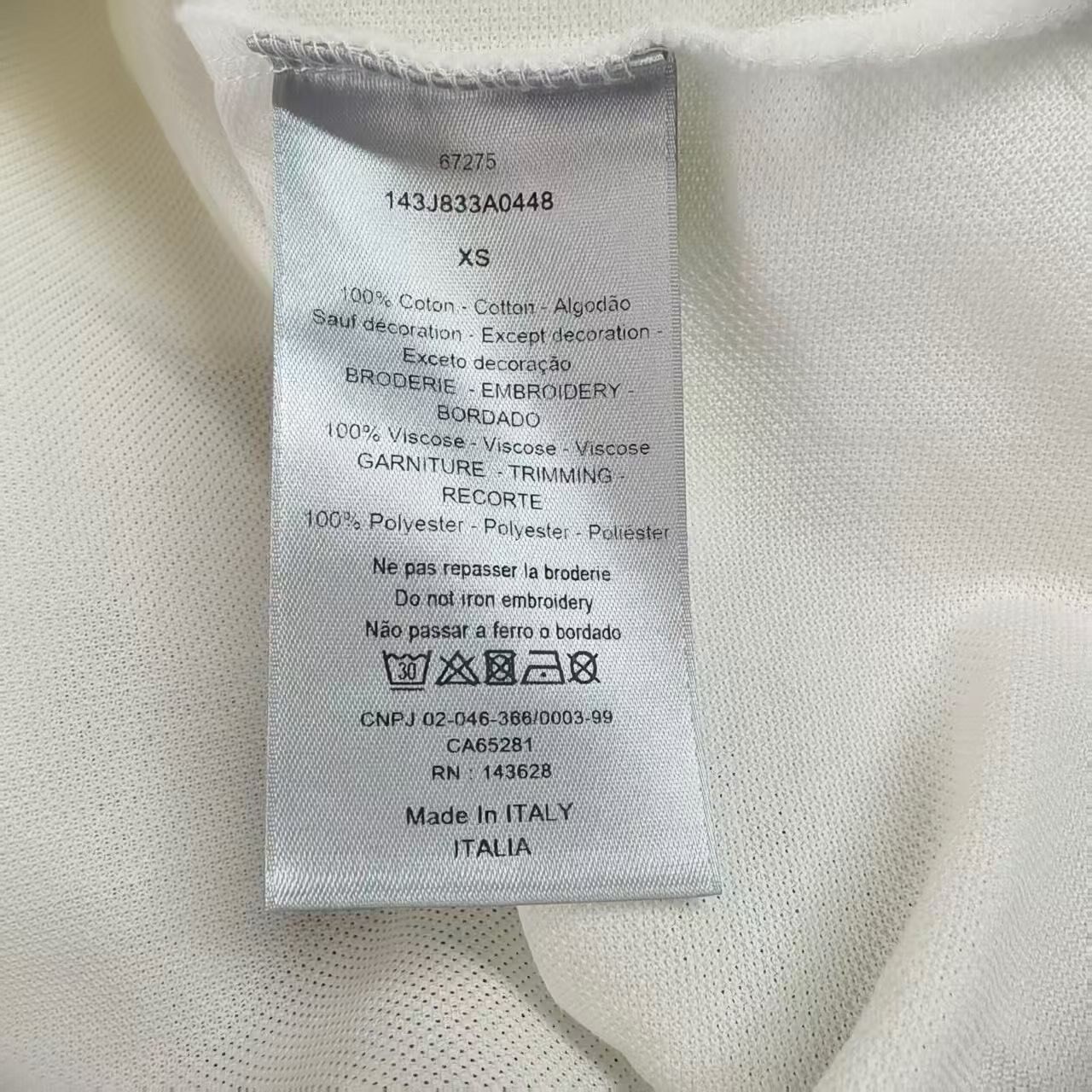 Dior x Kenny Scharf White Polo Shirt — label