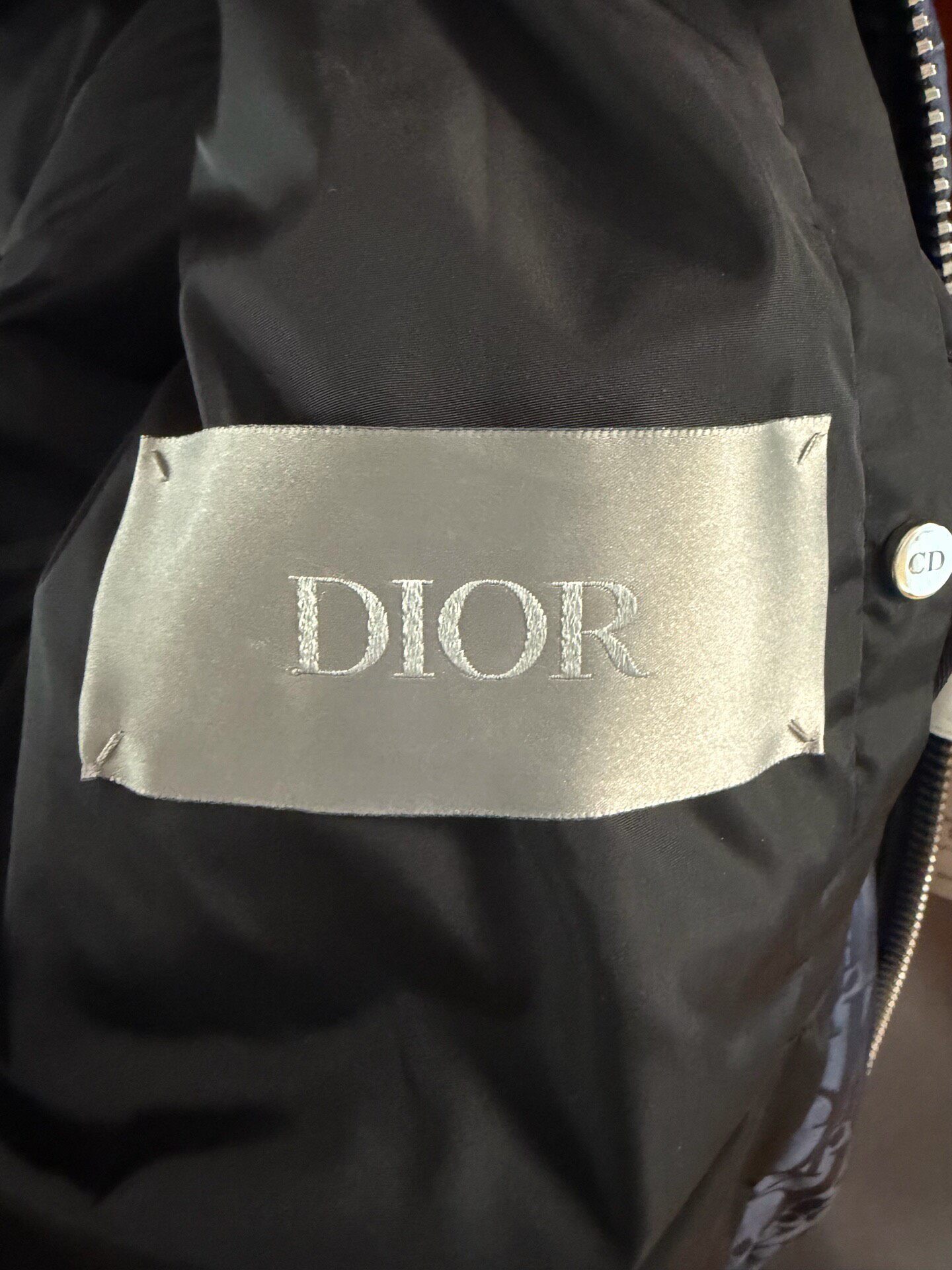 Dior Navy All-Logo Puffer Jacket — label