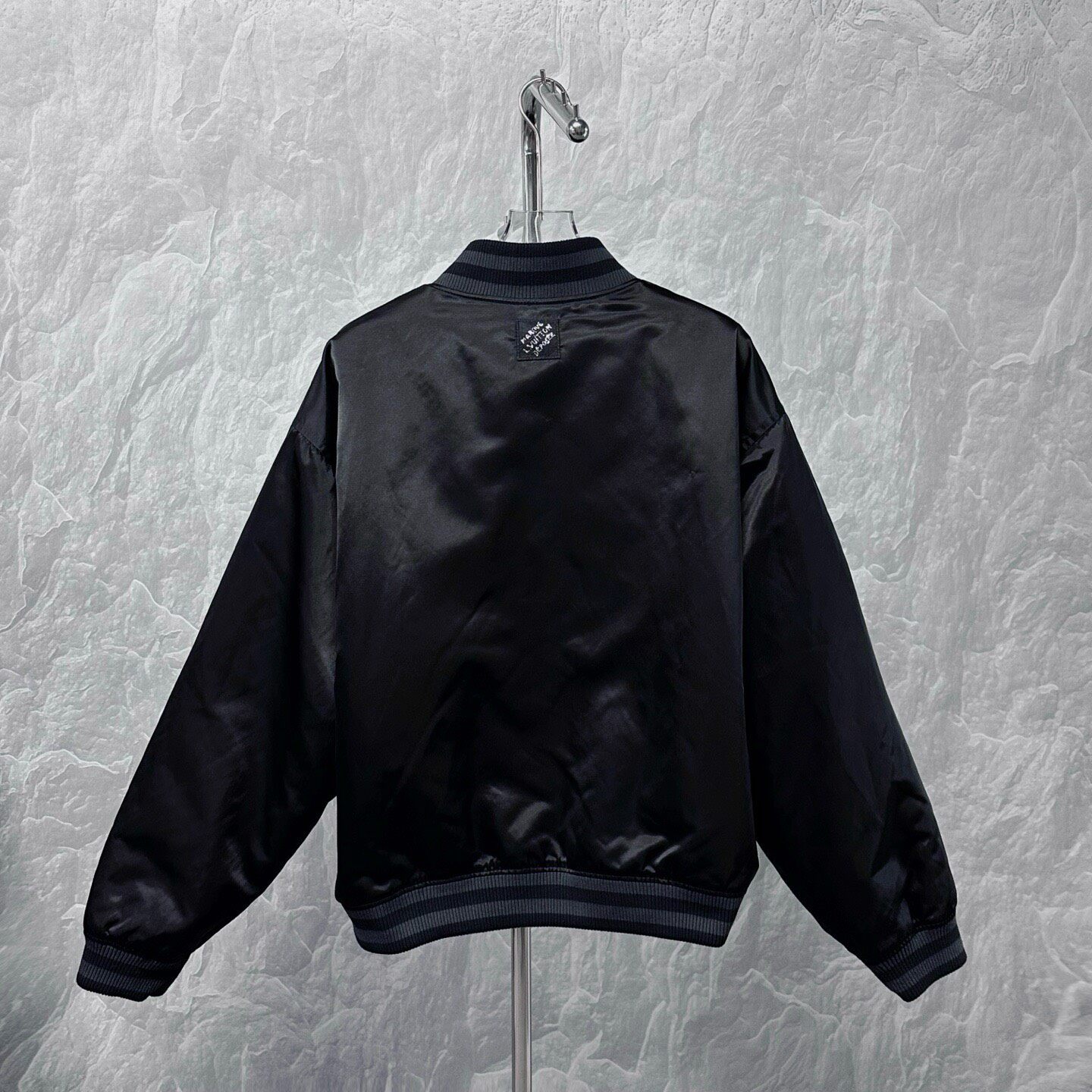 Louis Vuitton SS25 Rhinestone Logo Bomber Jacket — label