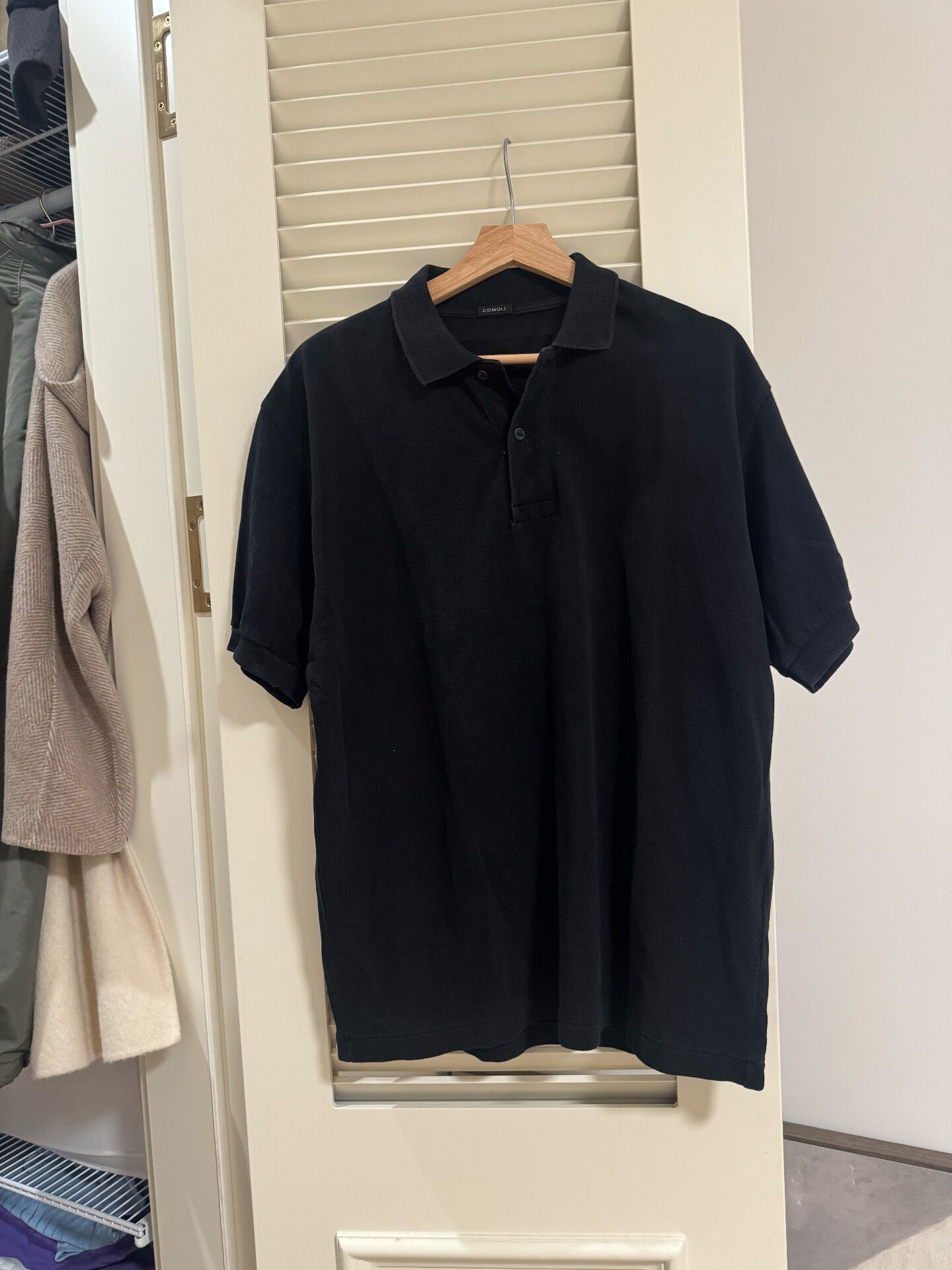 Comoli 26SS Oversized Black Polo Shirt — front