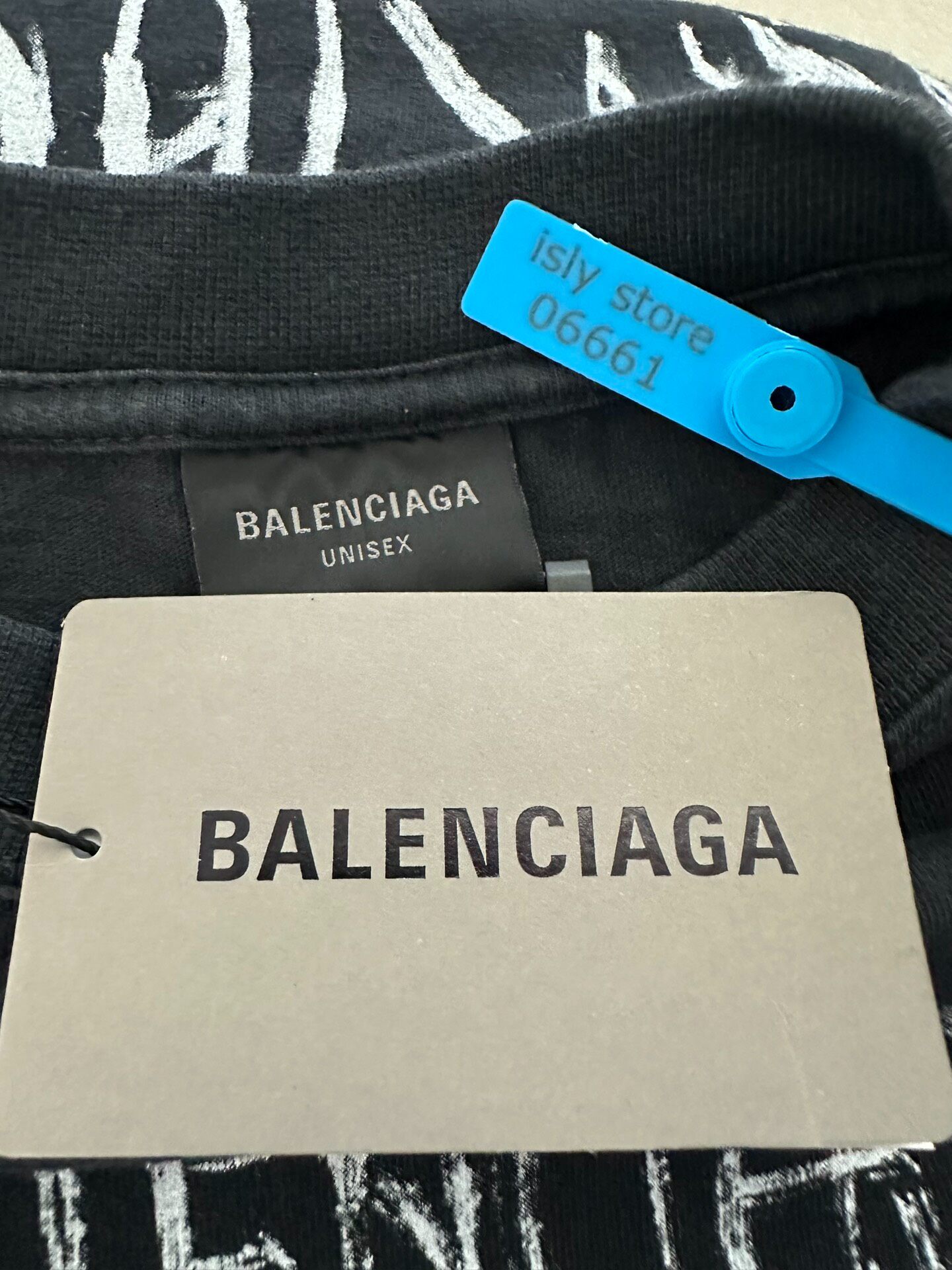Balenciaga New Year Print Long Sleeve Tee — label