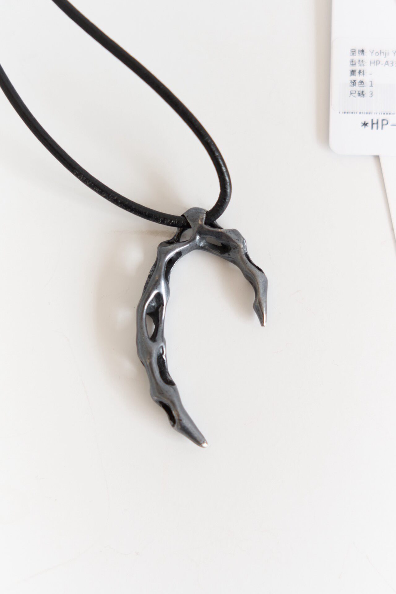 Yohji Yamamoto Hollow Crescent Necklace — front