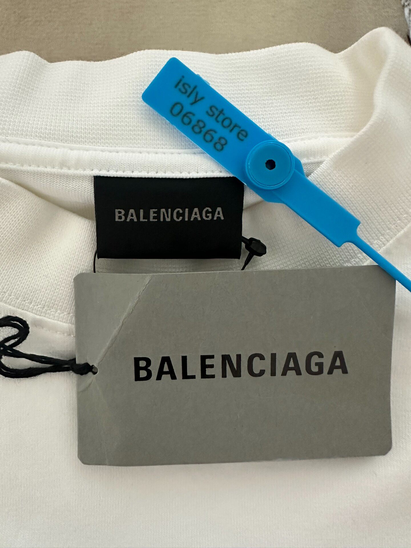 Balenciaga Women's White Short Sleeve T-Shirt — label