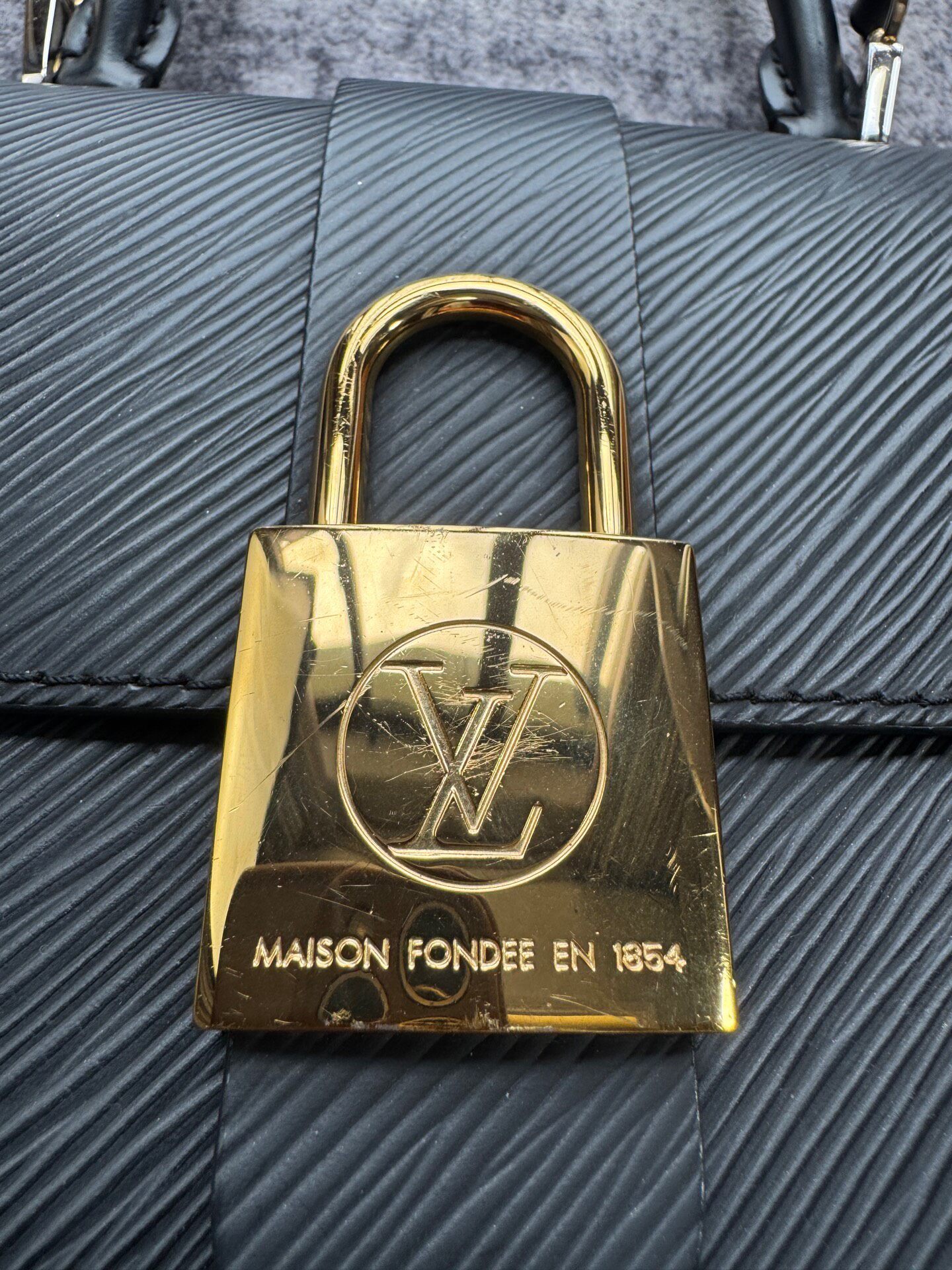 Louis Vuitton Locky BB Black Epi Bag — detail