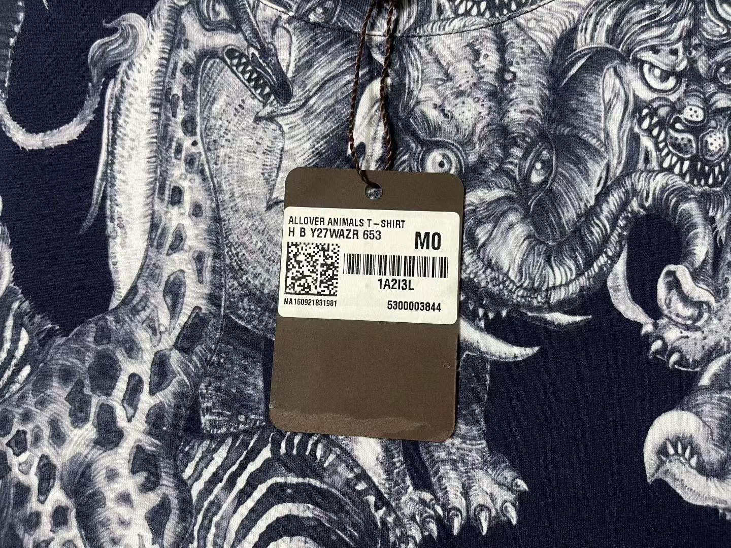 Louis Vuitton Navy Animal Print Tee — label