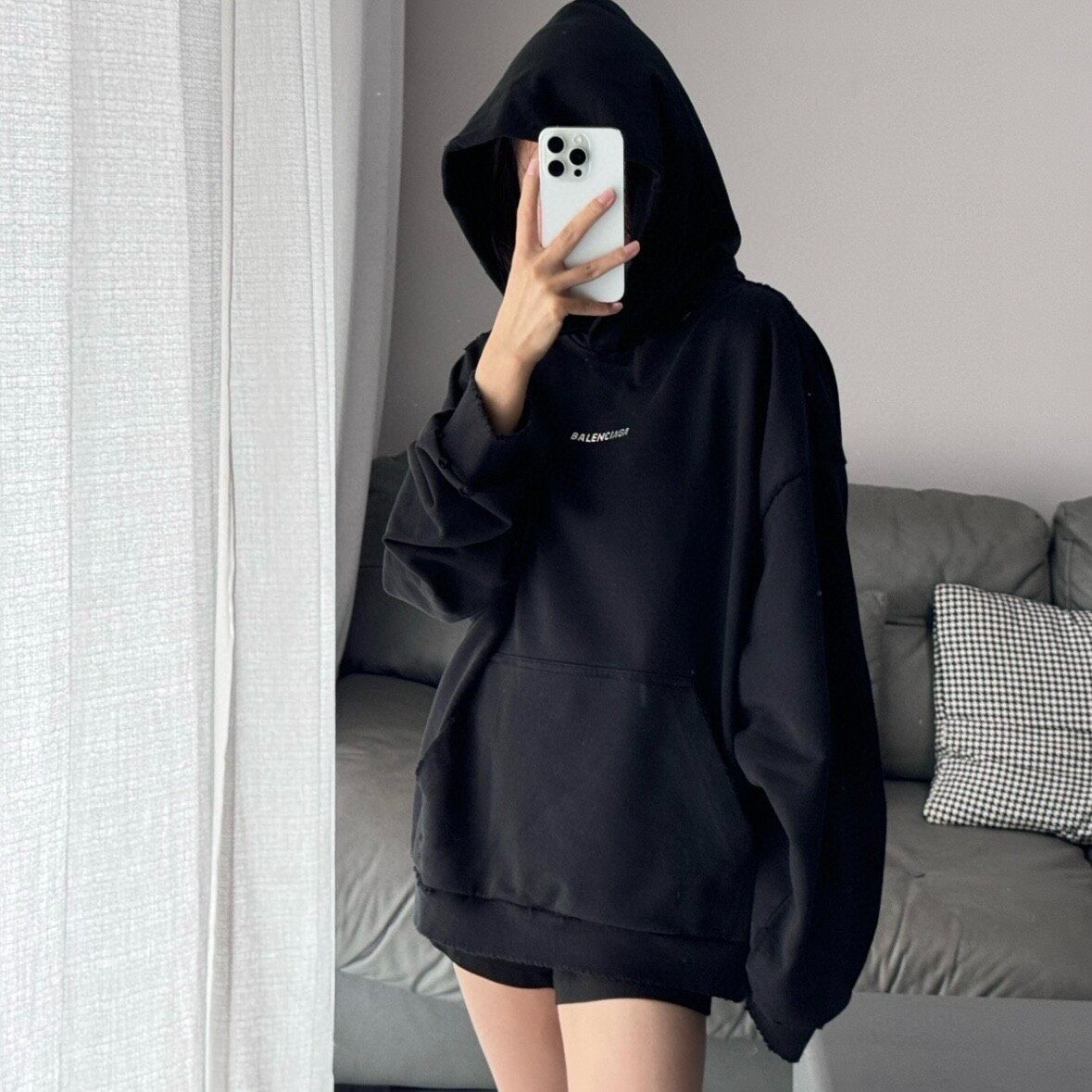 Balenciaga SS24 Distressed Logo Hoodie — front