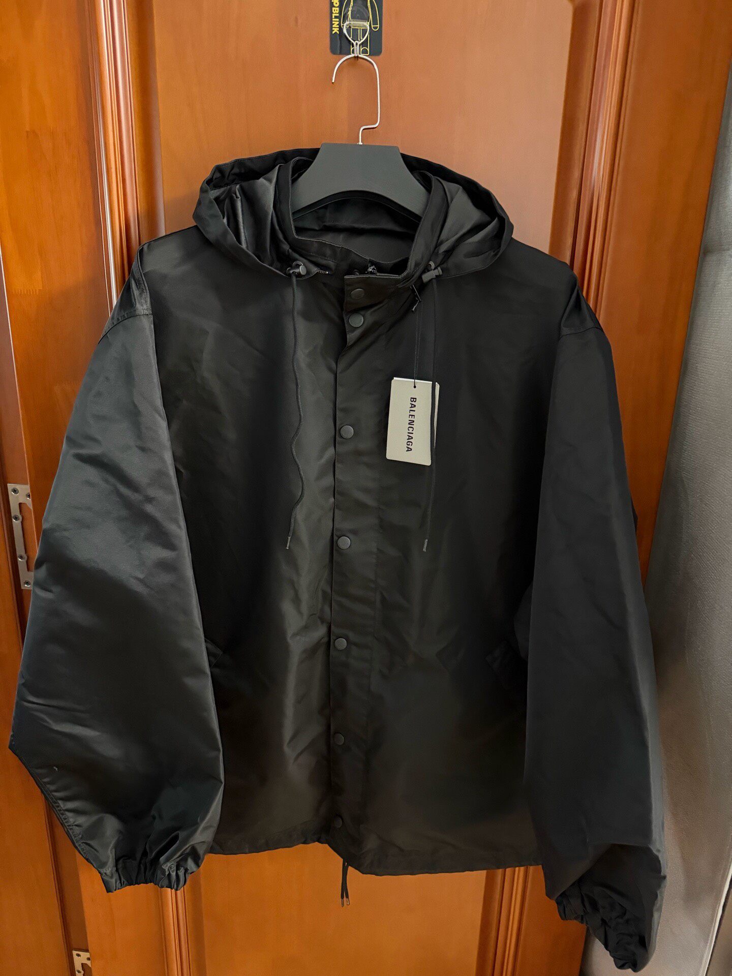 Balenciaga Tape Logo Hooded Windbreaker — front