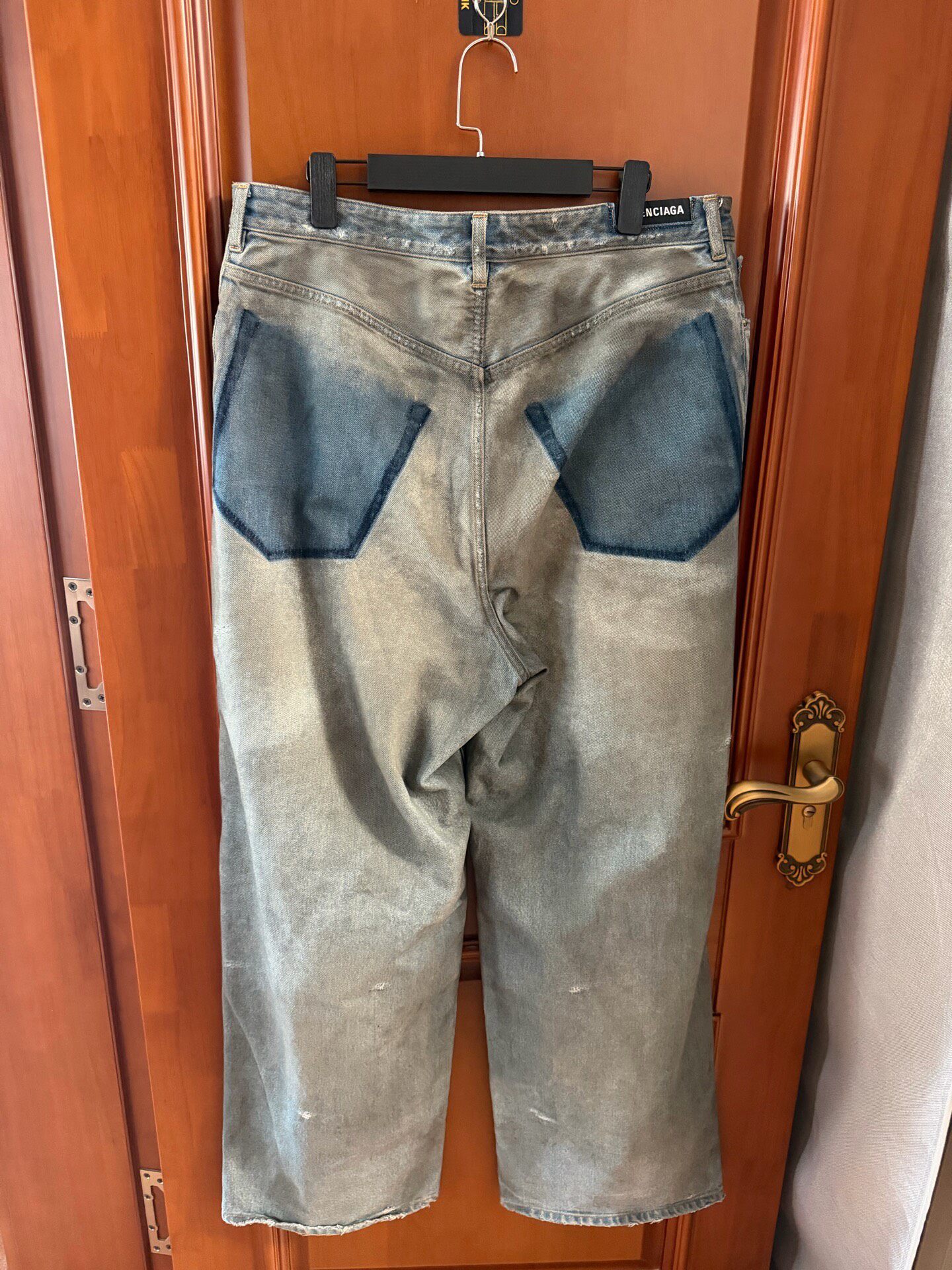 Balenciaga Reverse Pocket Distressed Jeans — front