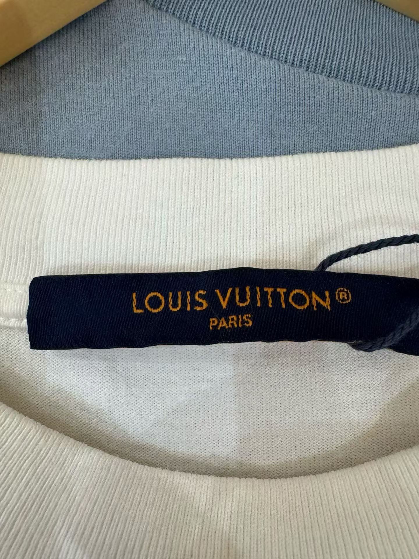 Louis Vuitton White Embossed Logo T-Shirt — detail
