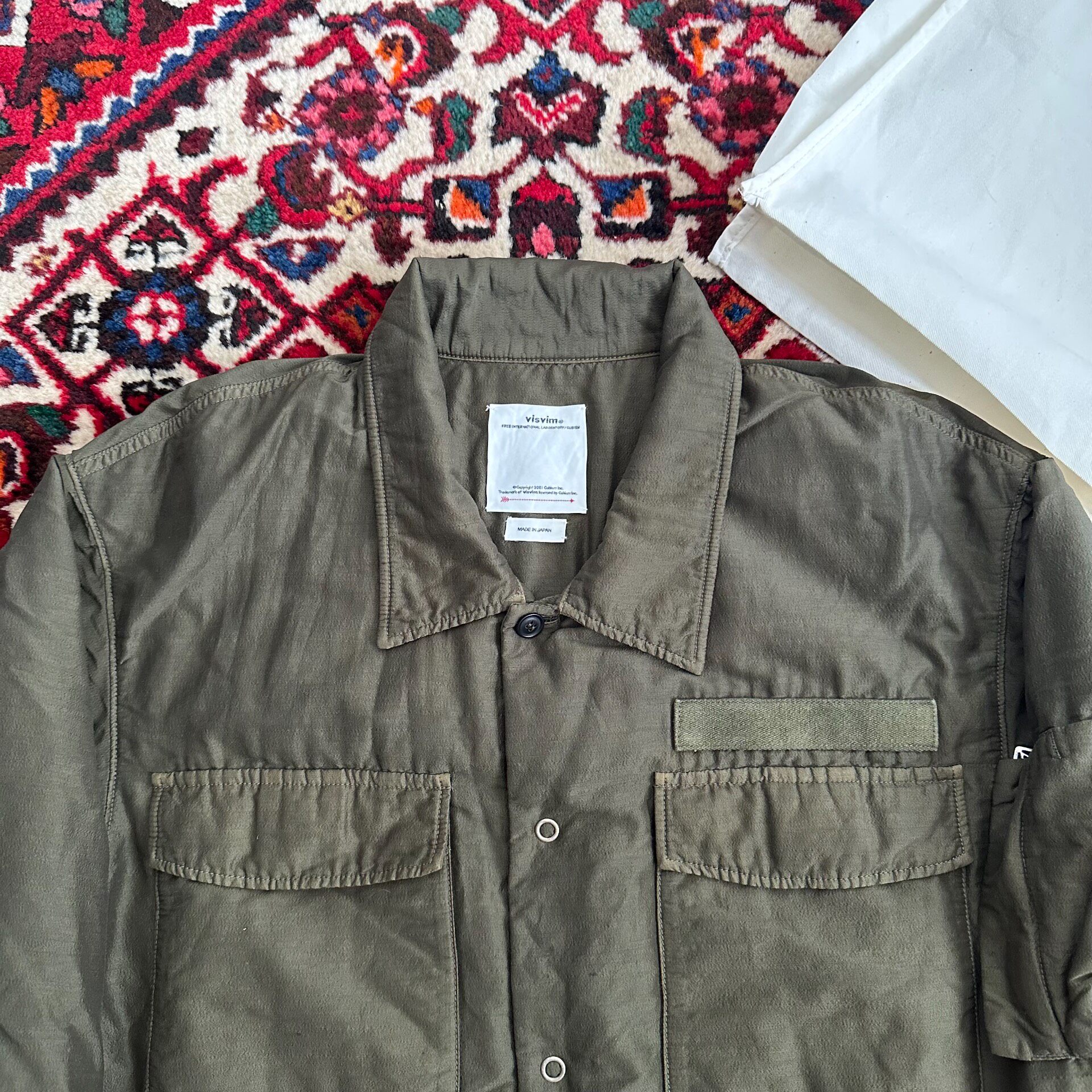 Visvim 23AW Heli Crew Down Shirt Jacket — label
