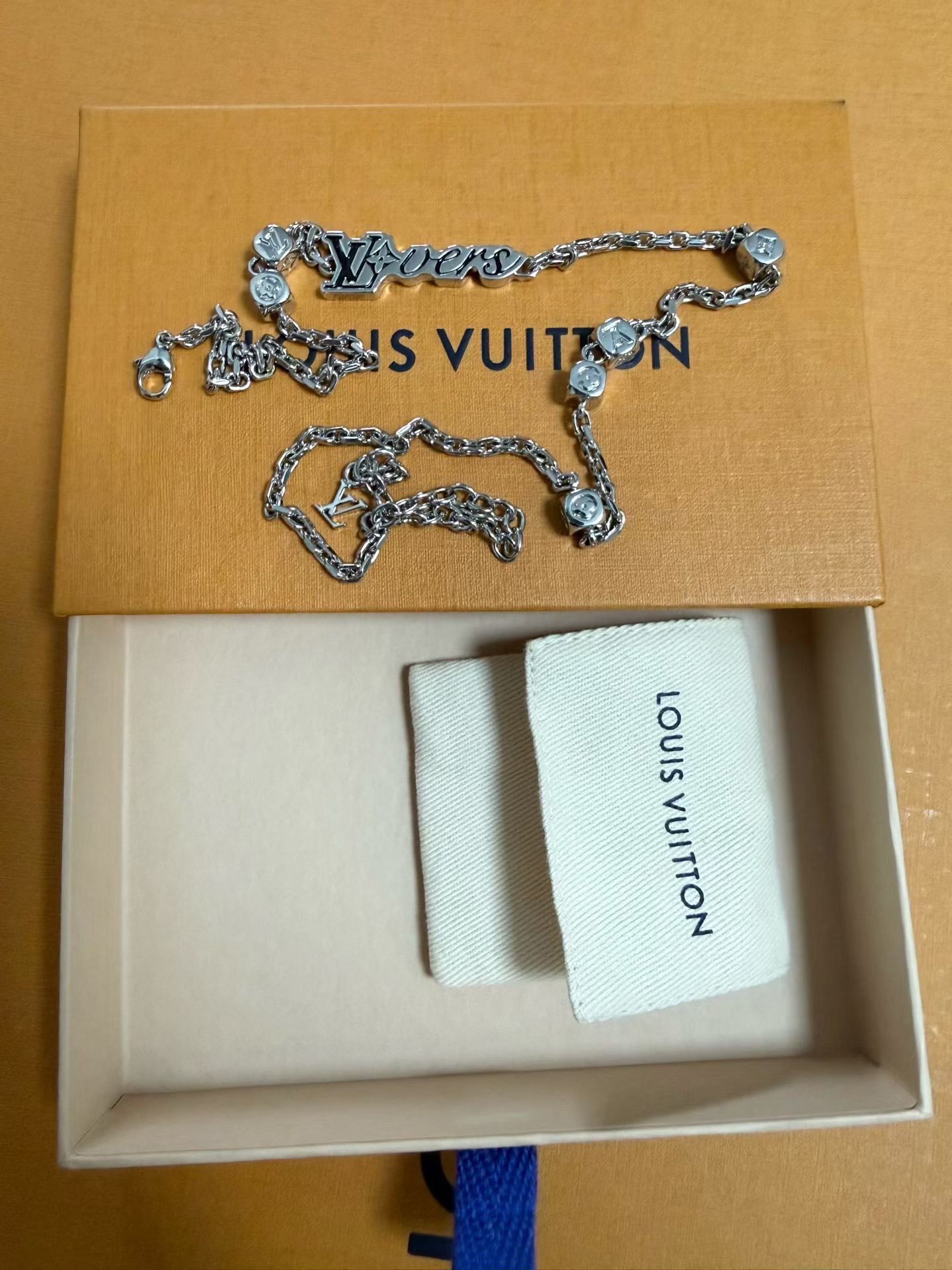 Louis Vuitton LV Metal Letter Necklace — front