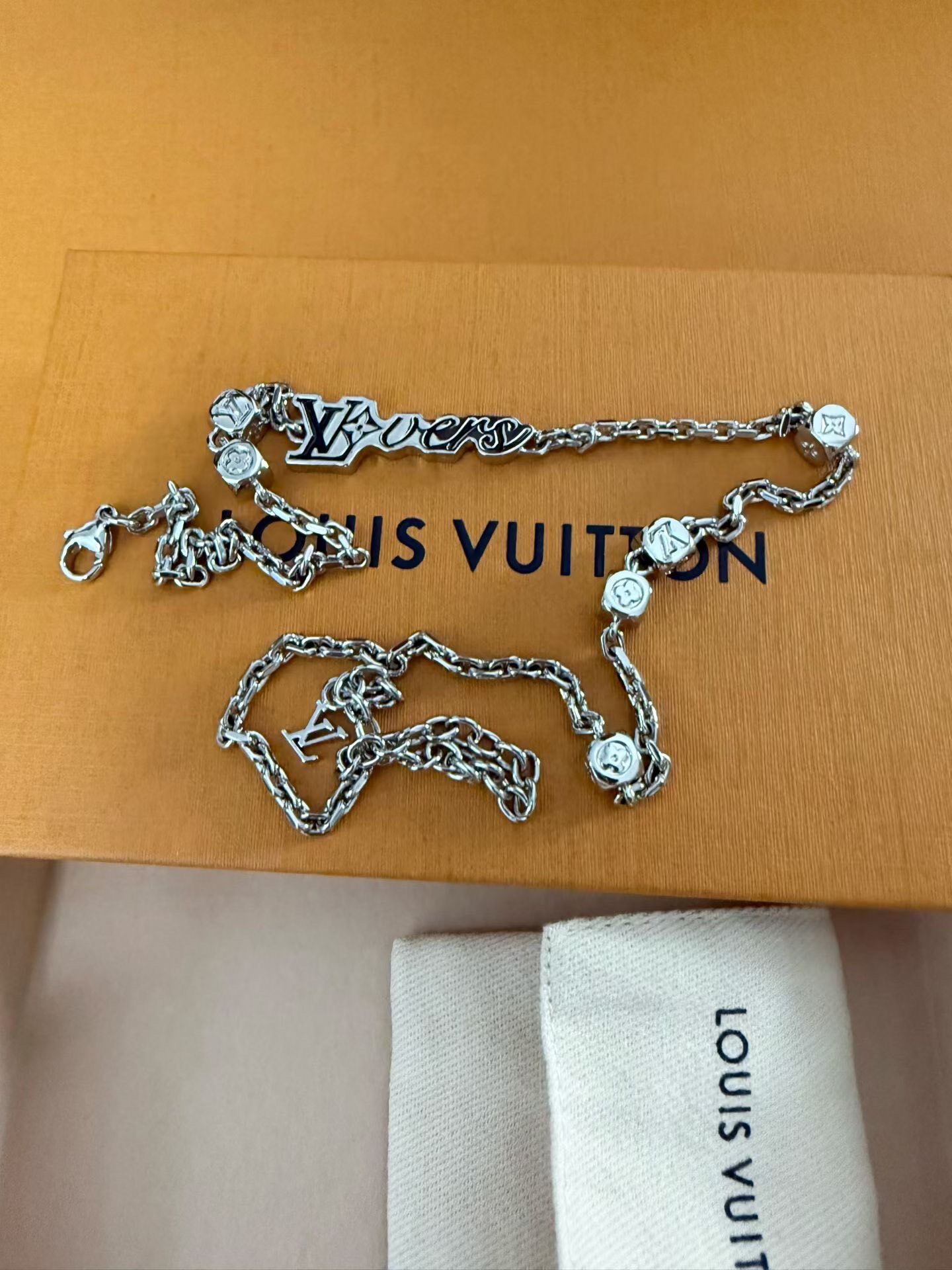 Louis Vuitton LV Metal Letter Necklace — detail