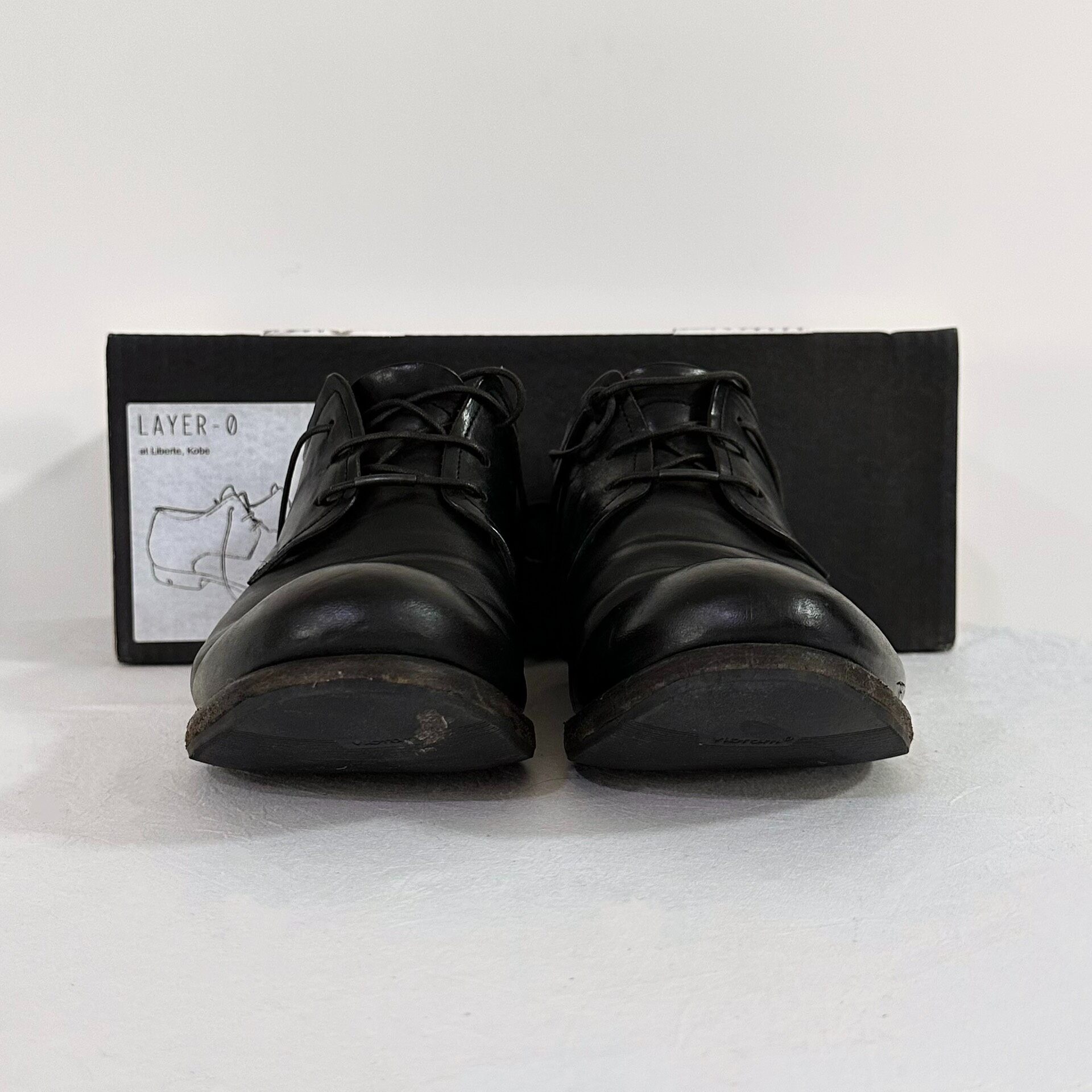 LAYER-0 Black Cordovan Derby Shoes — back