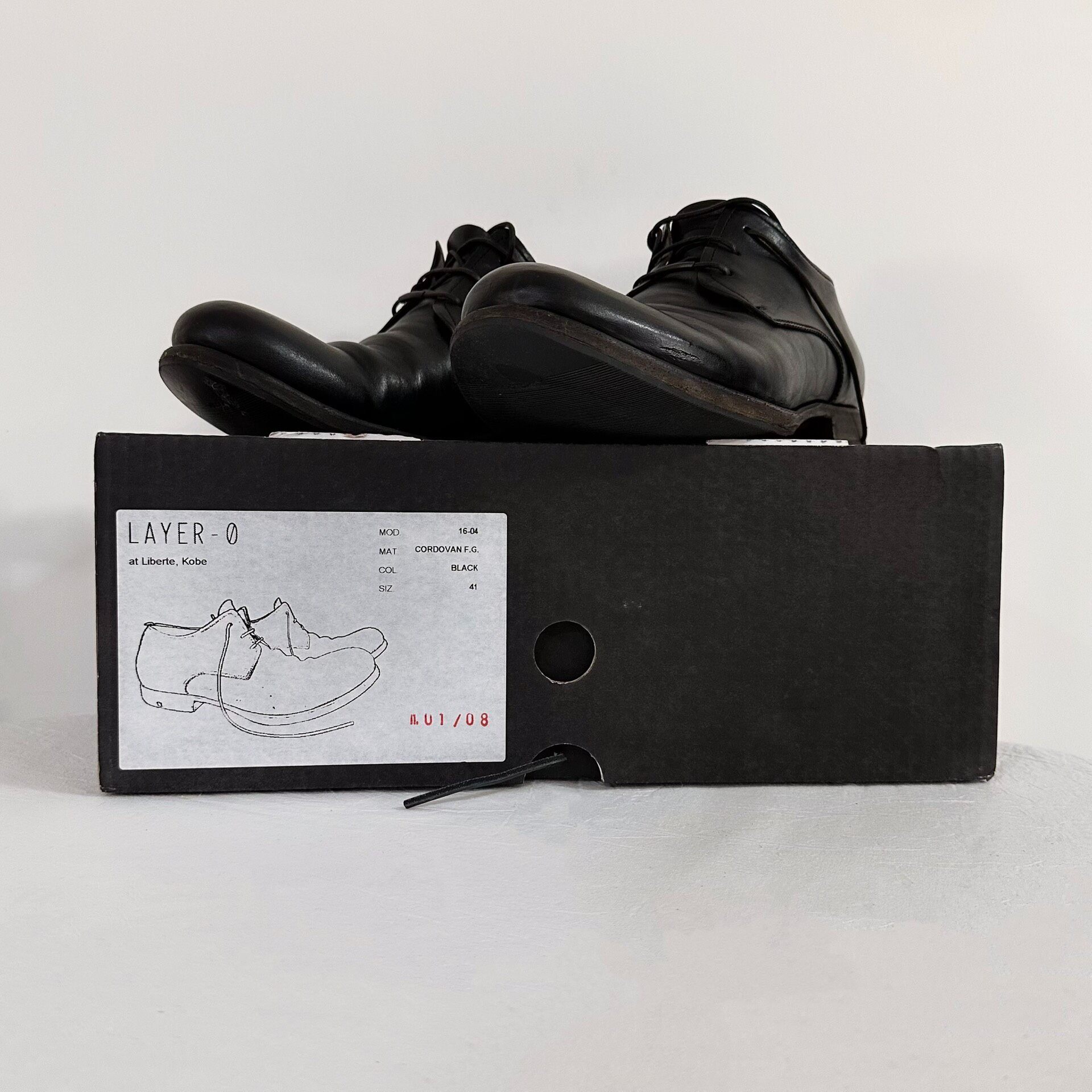 LAYER-0 Black Cordovan Derby Shoes — detail