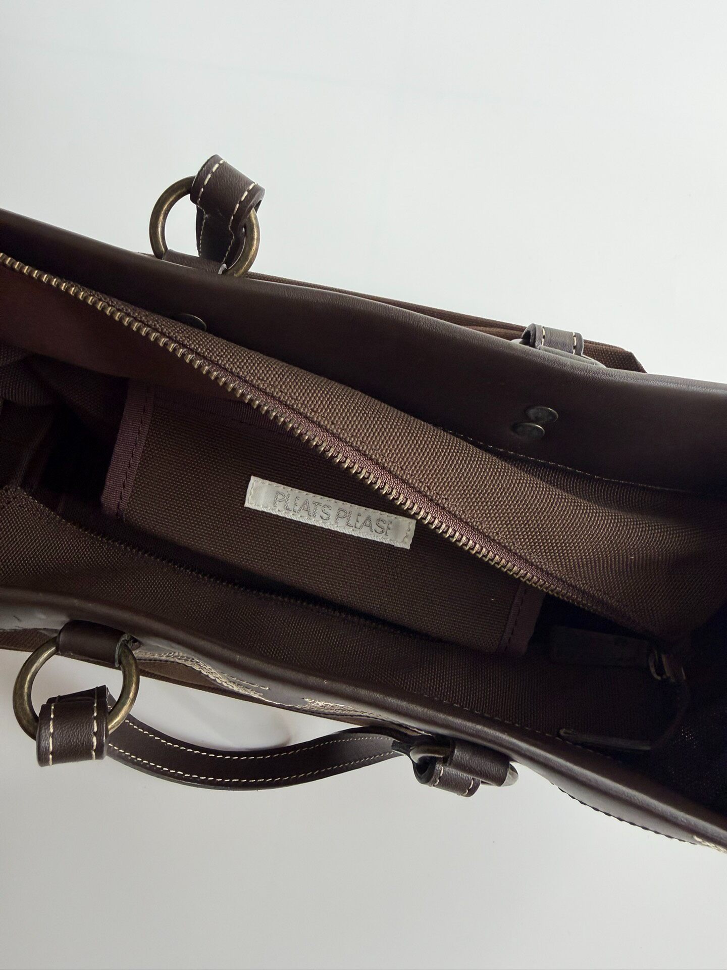 Issey Miyake Brown Pleated Tote Bag — label