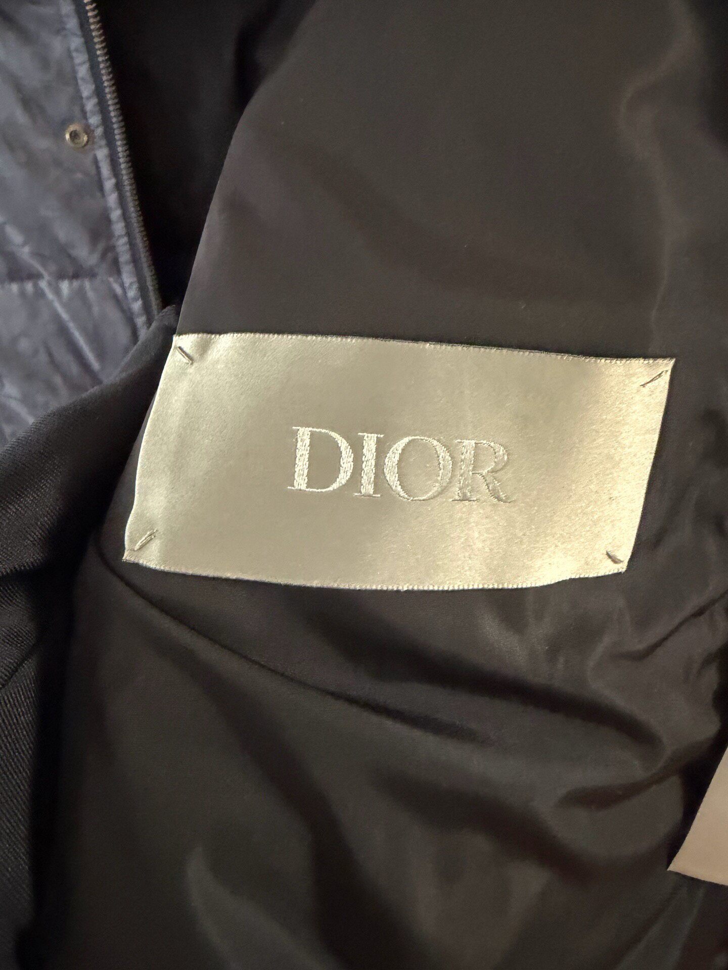Dior Light Blue Monogram Puffer Jacket — label