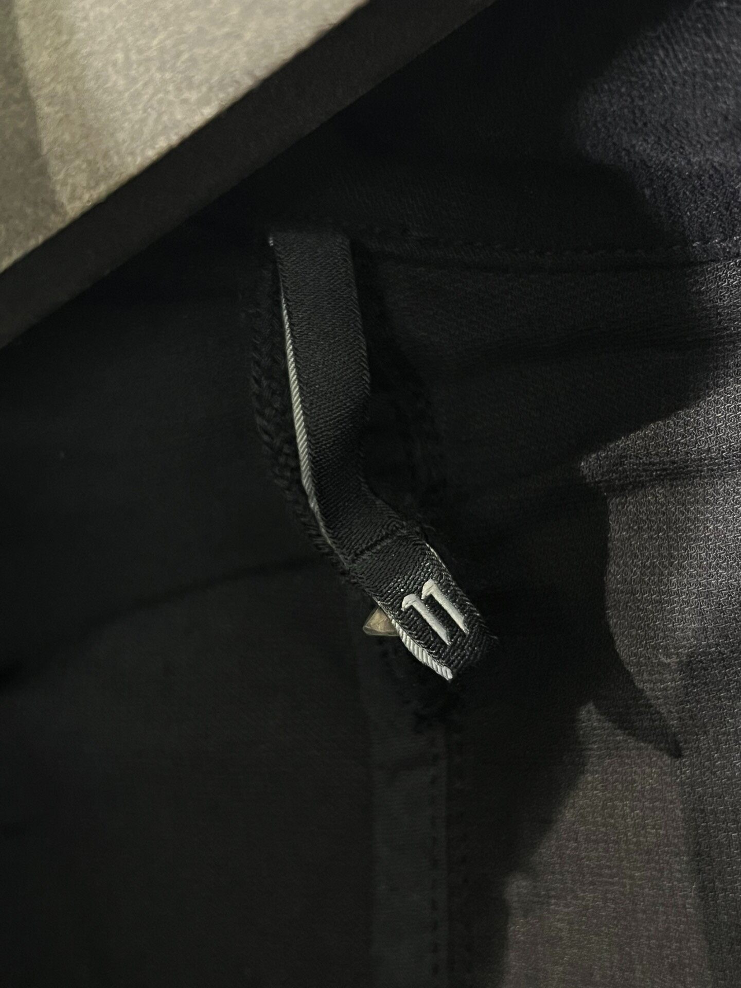 Boris Bidjan Saberi Mid-Length Hooded Jacket — label
