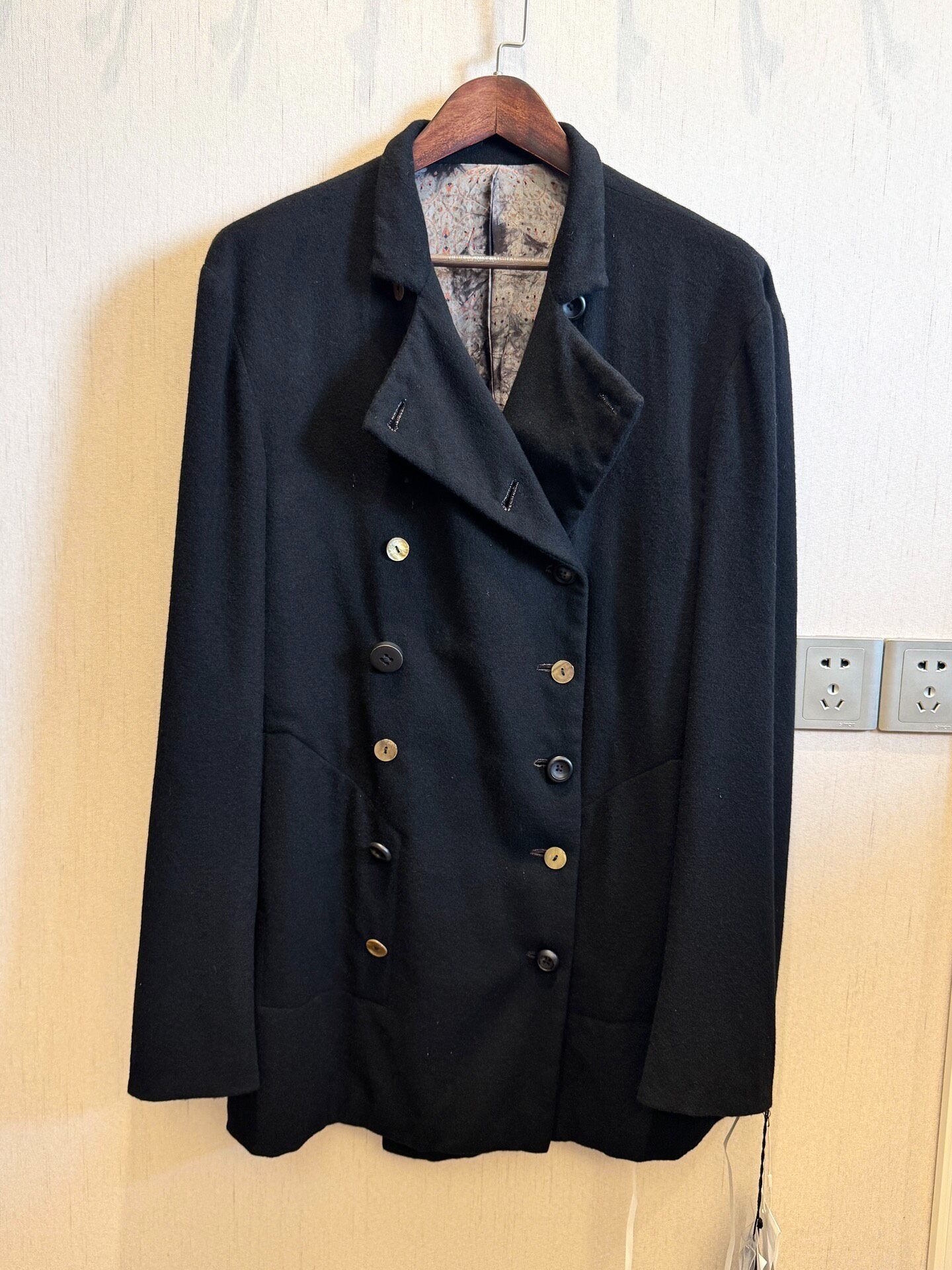 Black Double-Breasted Napoleon Coat — detail