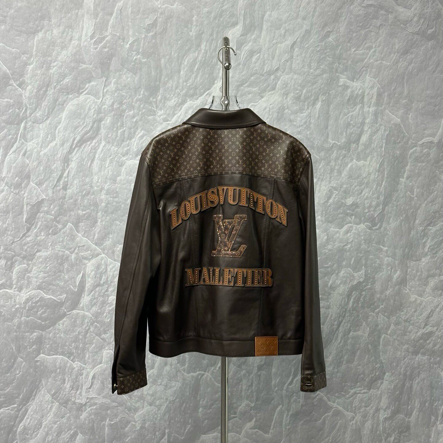 Louis Vuitton SS25 Logo Print Leather Jacket — label