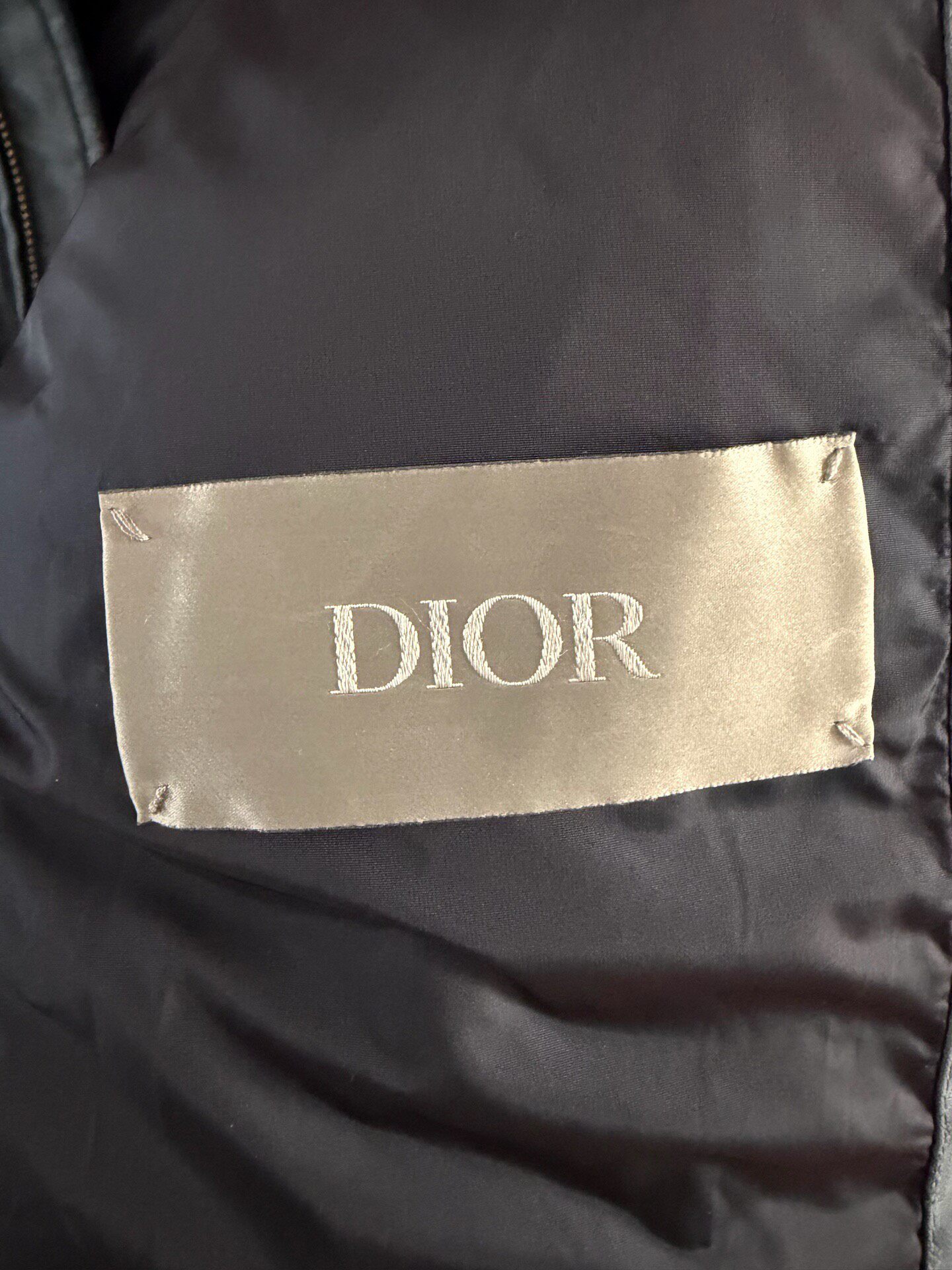 Dior Haze Blue Monogram Puffer Jacket — label