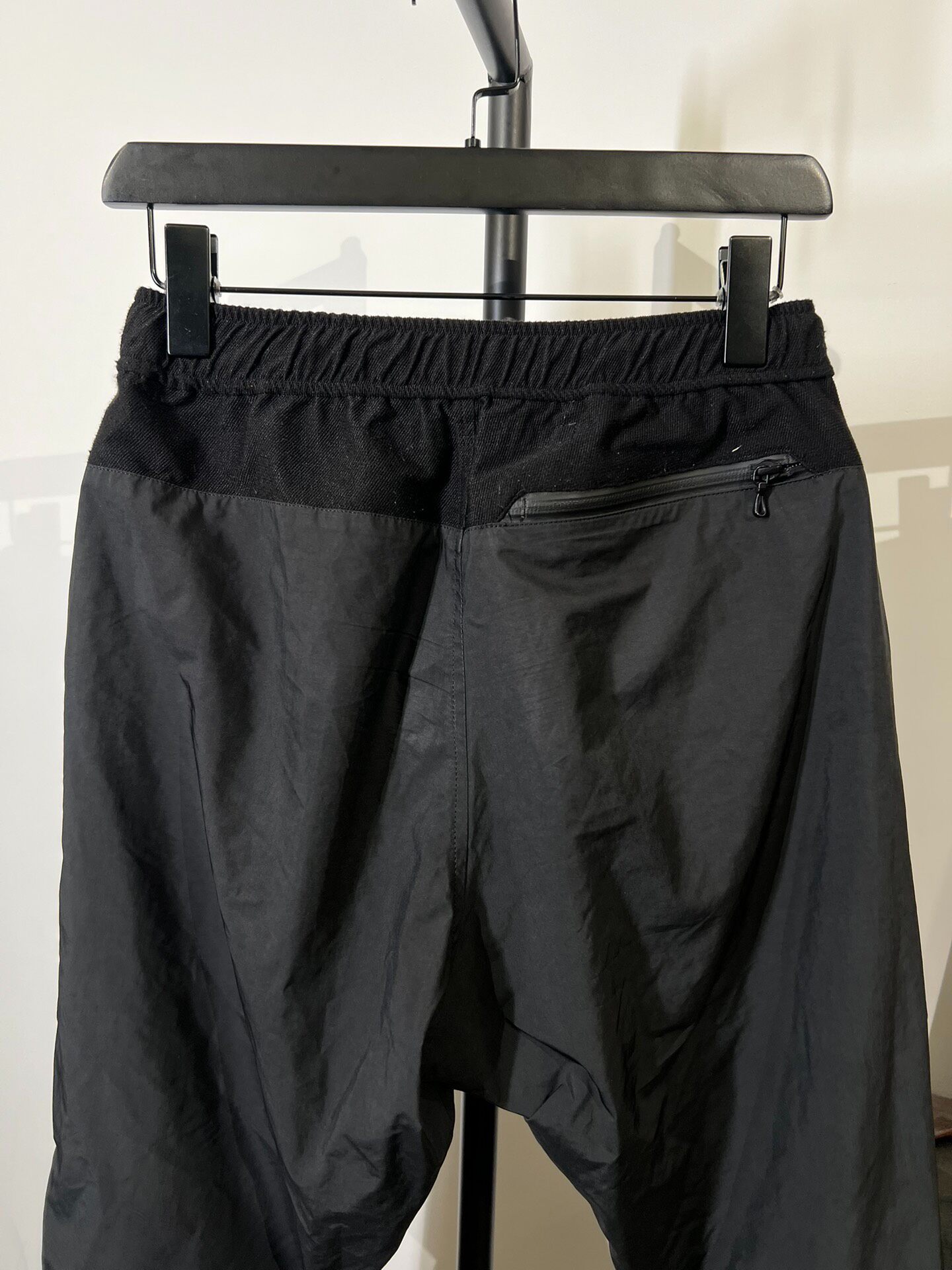 Black Nylon Spliced Technical Joggers — label