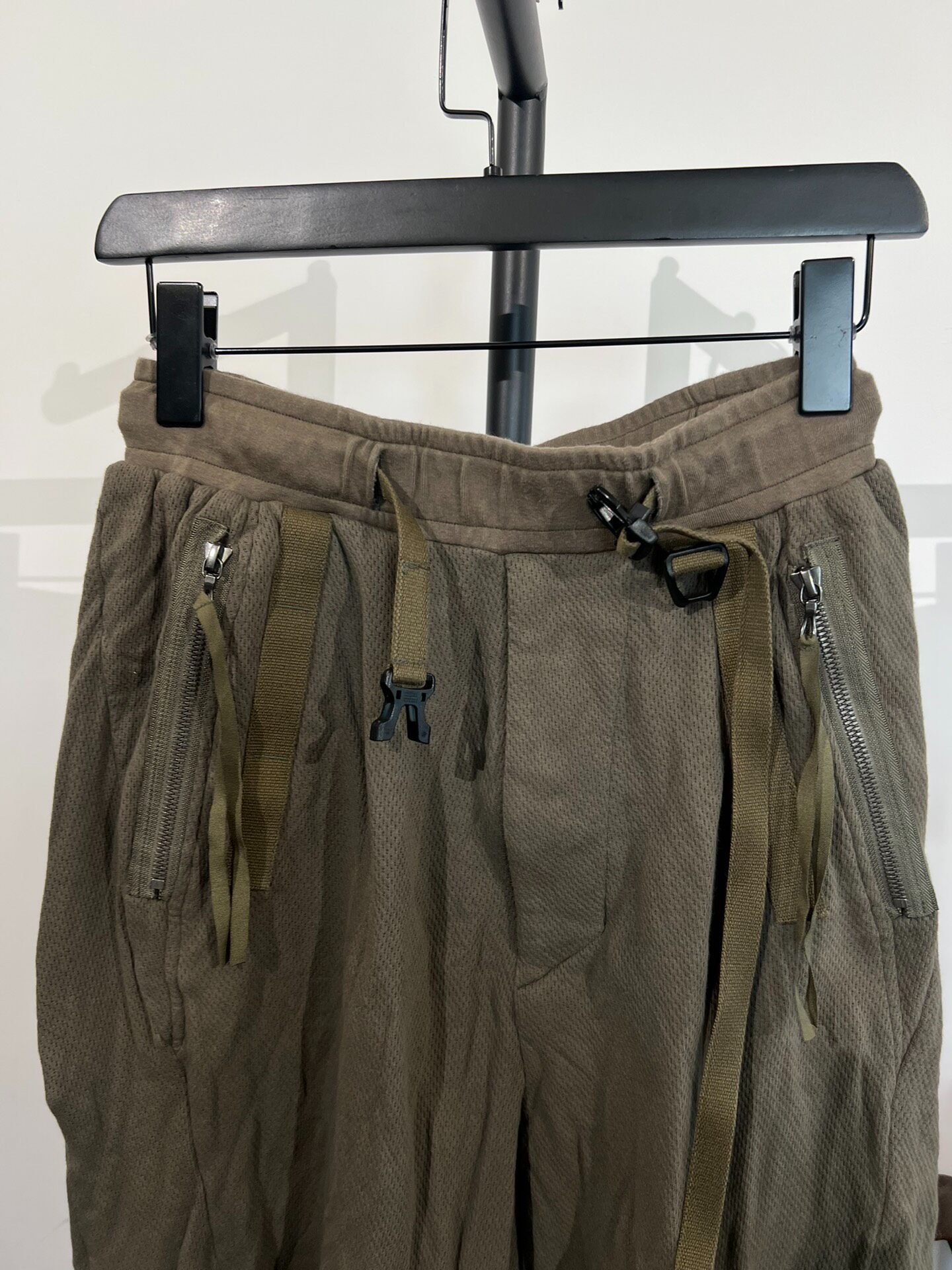 Julius Olive Green Buckle Strap Shorts — detail