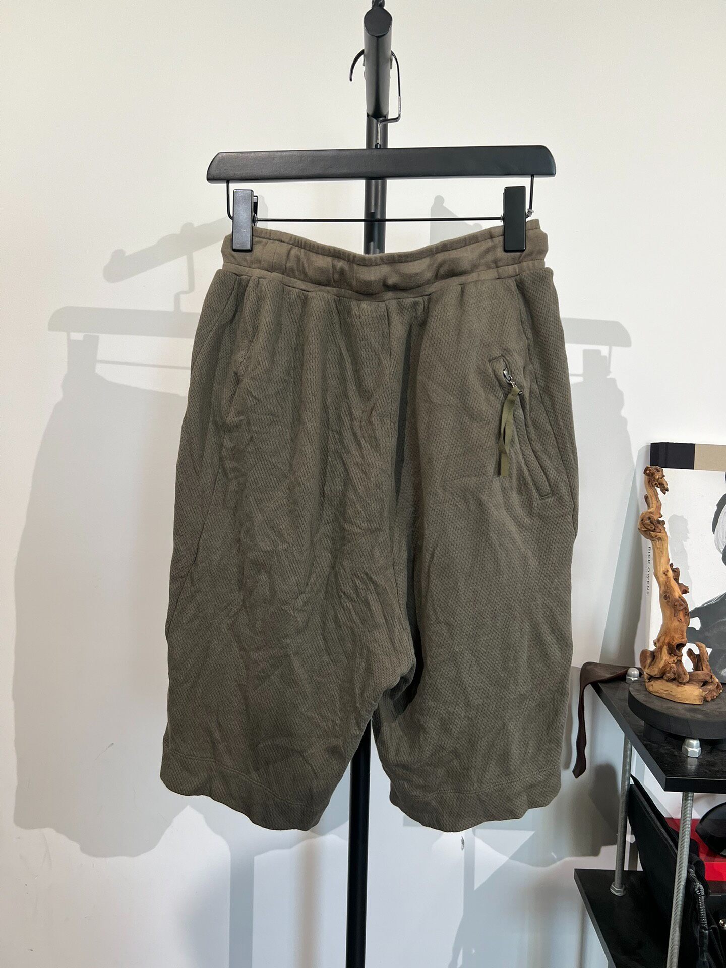 Julius Olive Green Buckle Strap Shorts — front