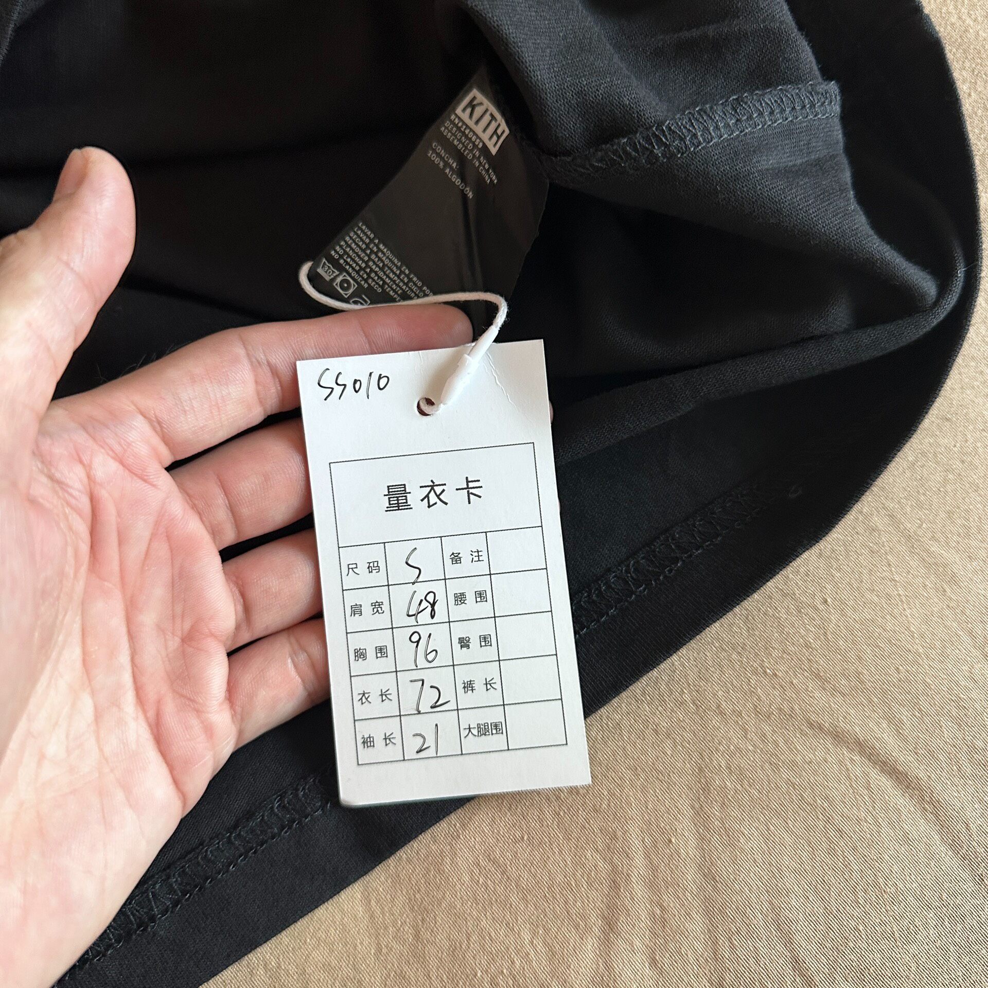 Kith Smiley Black Short-Sleeve Tee — label