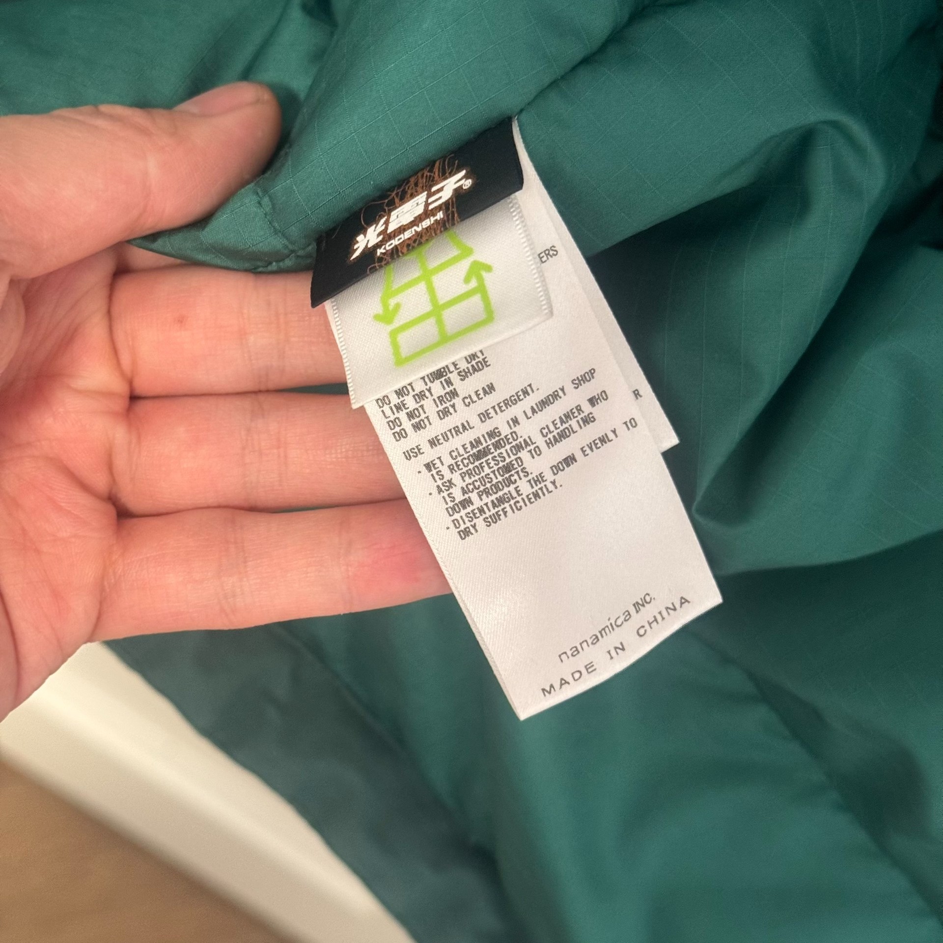 The North Face Hooded Down Jacket — label