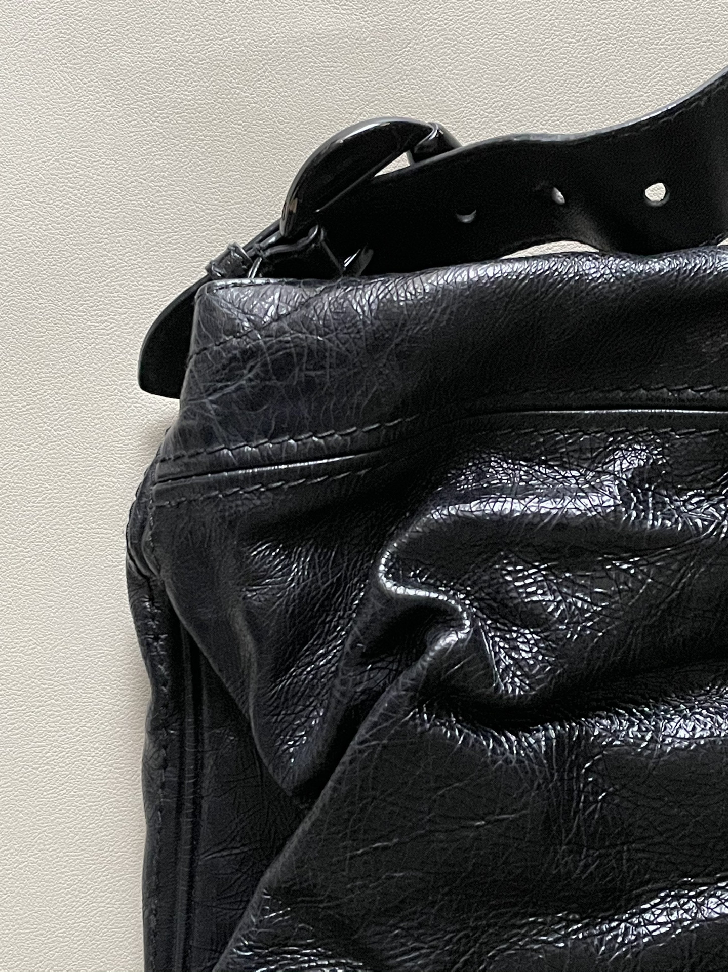 Alexander McQueen Oil-Wax Leather Saddle Bag — label