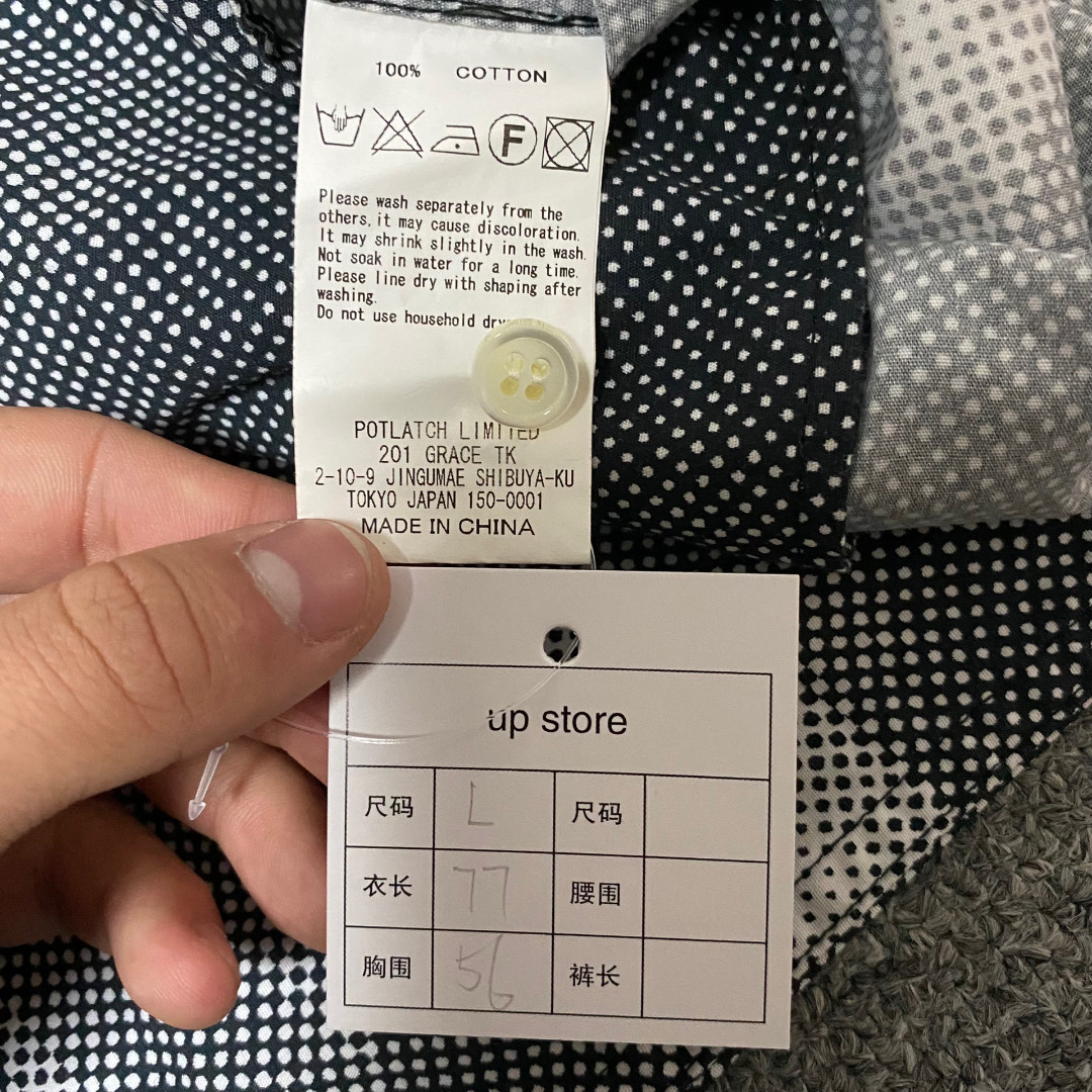CAVEMPT Pixel Building Long Sleeve Shirt — label