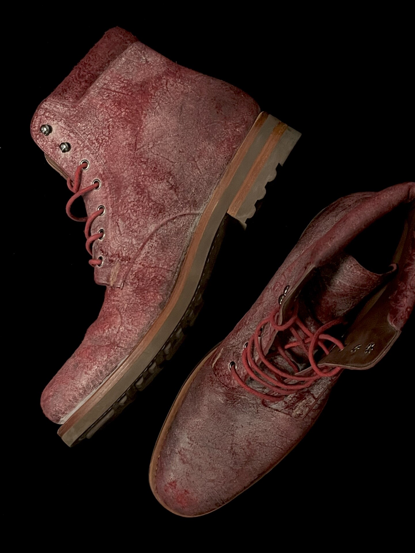 Alexander McQueen Distressed Leather Martin Boots — front