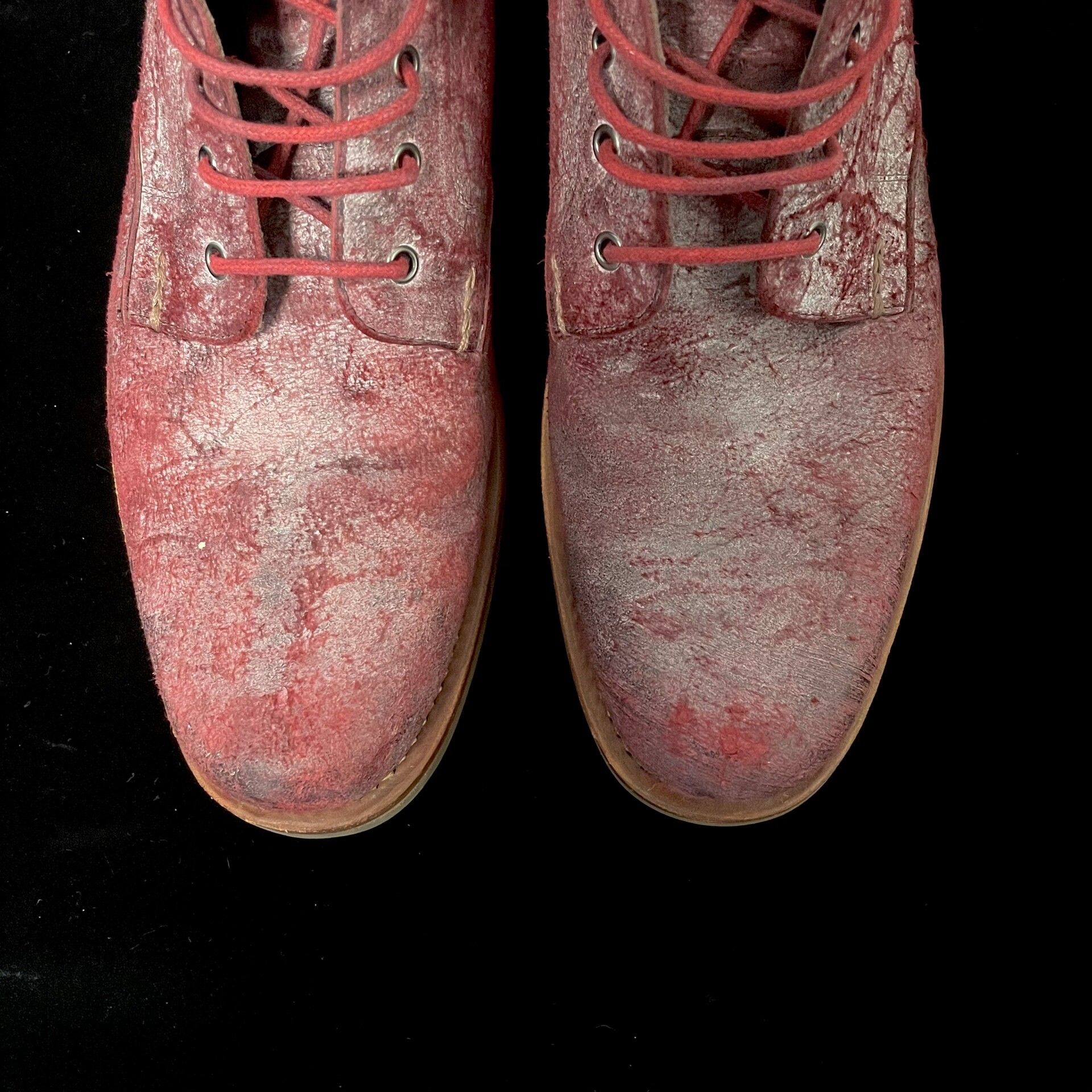 Alexander McQueen Distressed Leather Martin Boots — detail
