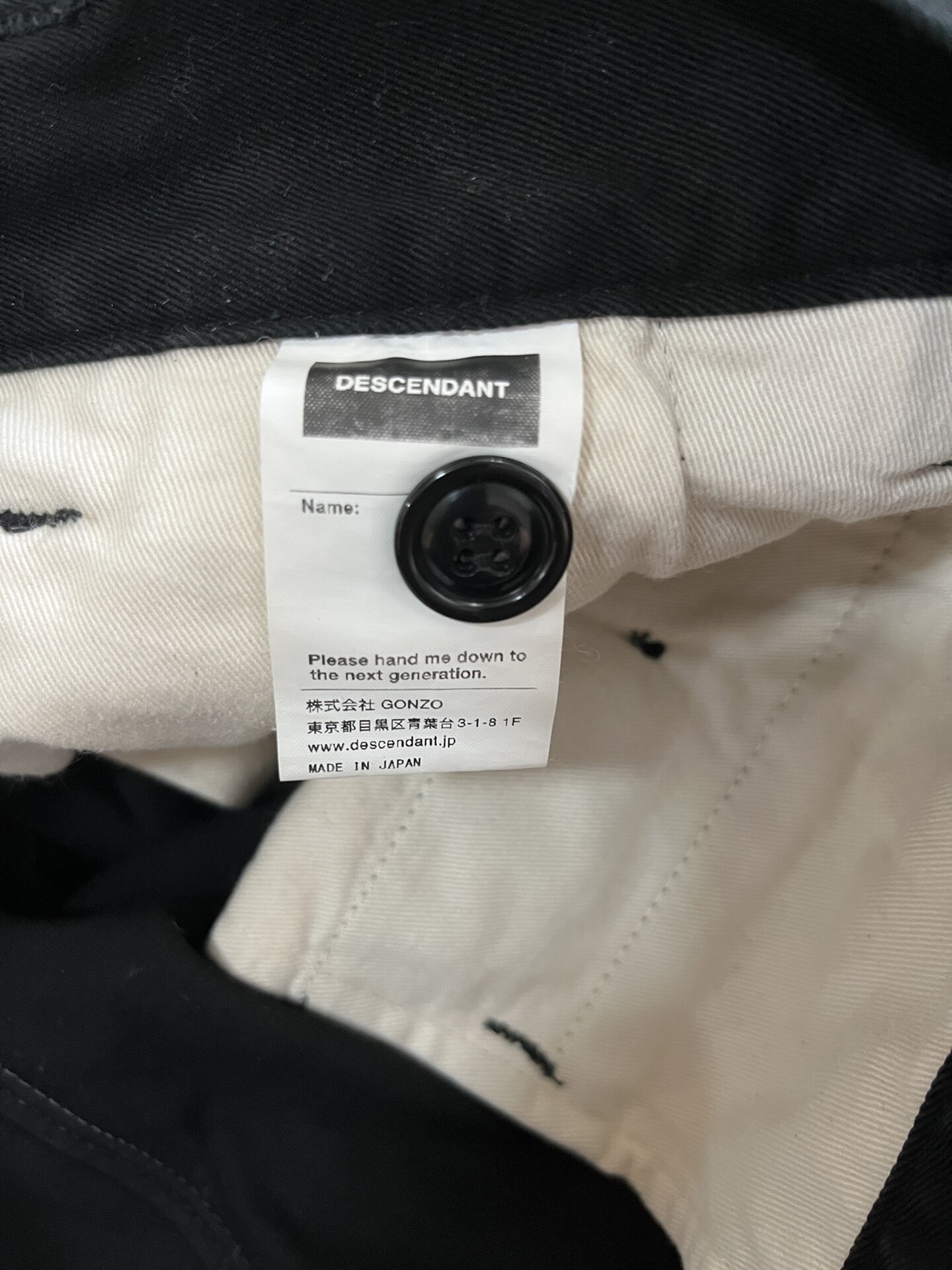 Descendant DC-3 Twill Trousers — label