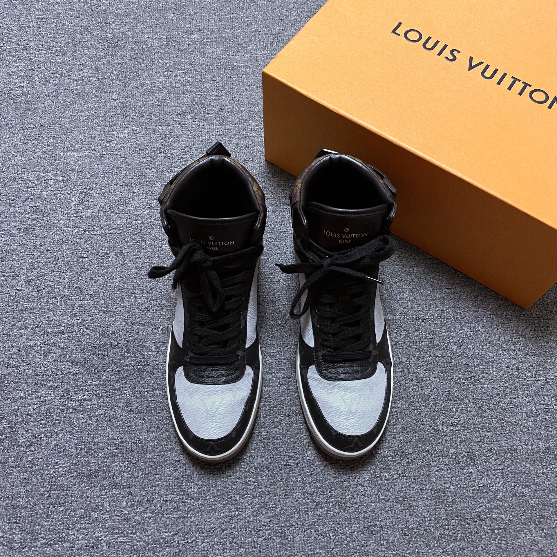 Louis Vuitton LV Rivoli Monogram Sneakers — front