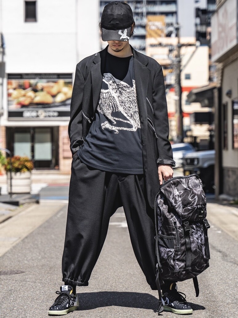 Yohji x New Era Skull Rose Backpack — label
