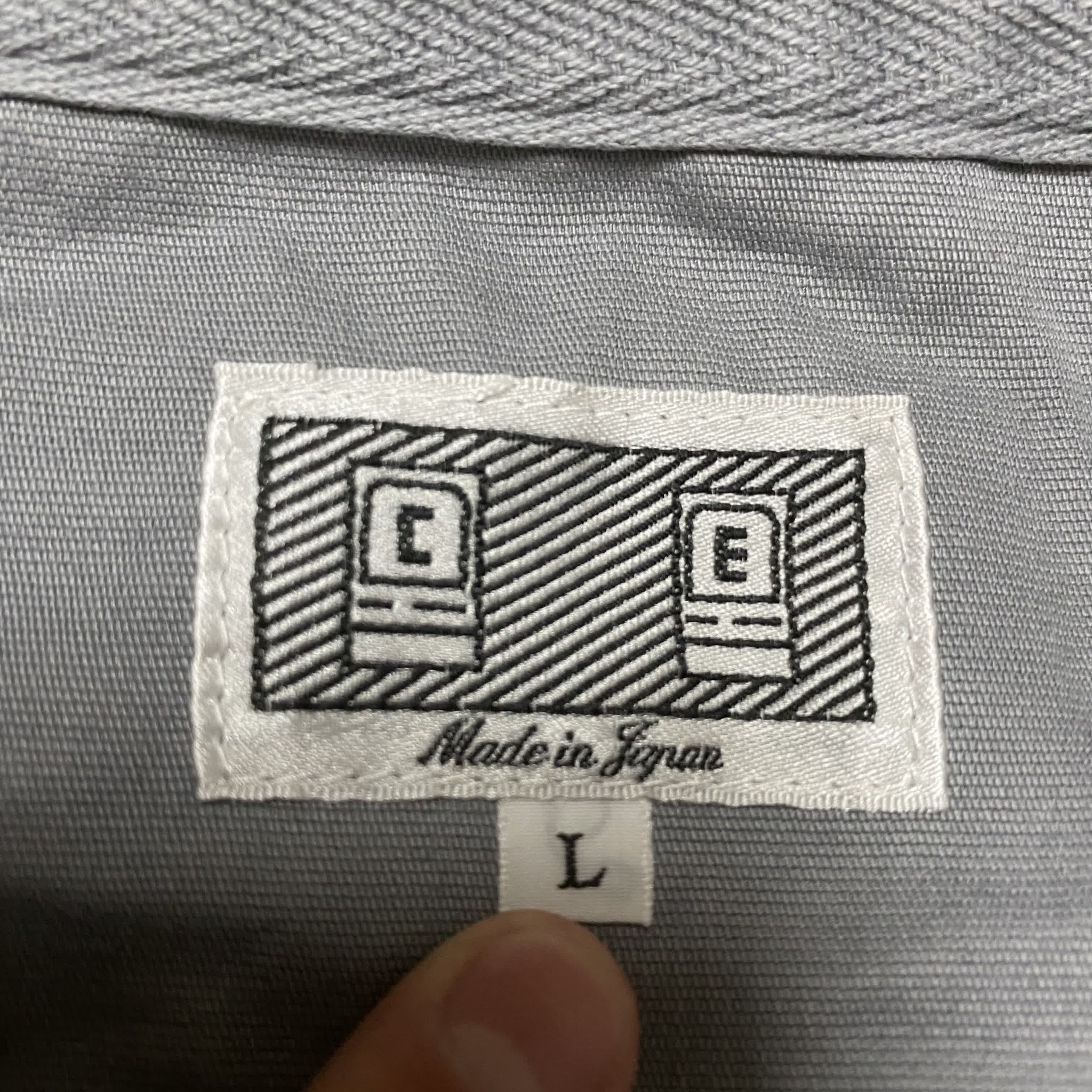 CAVEMPT Light Gray Washed Zip-Up Jacket — label