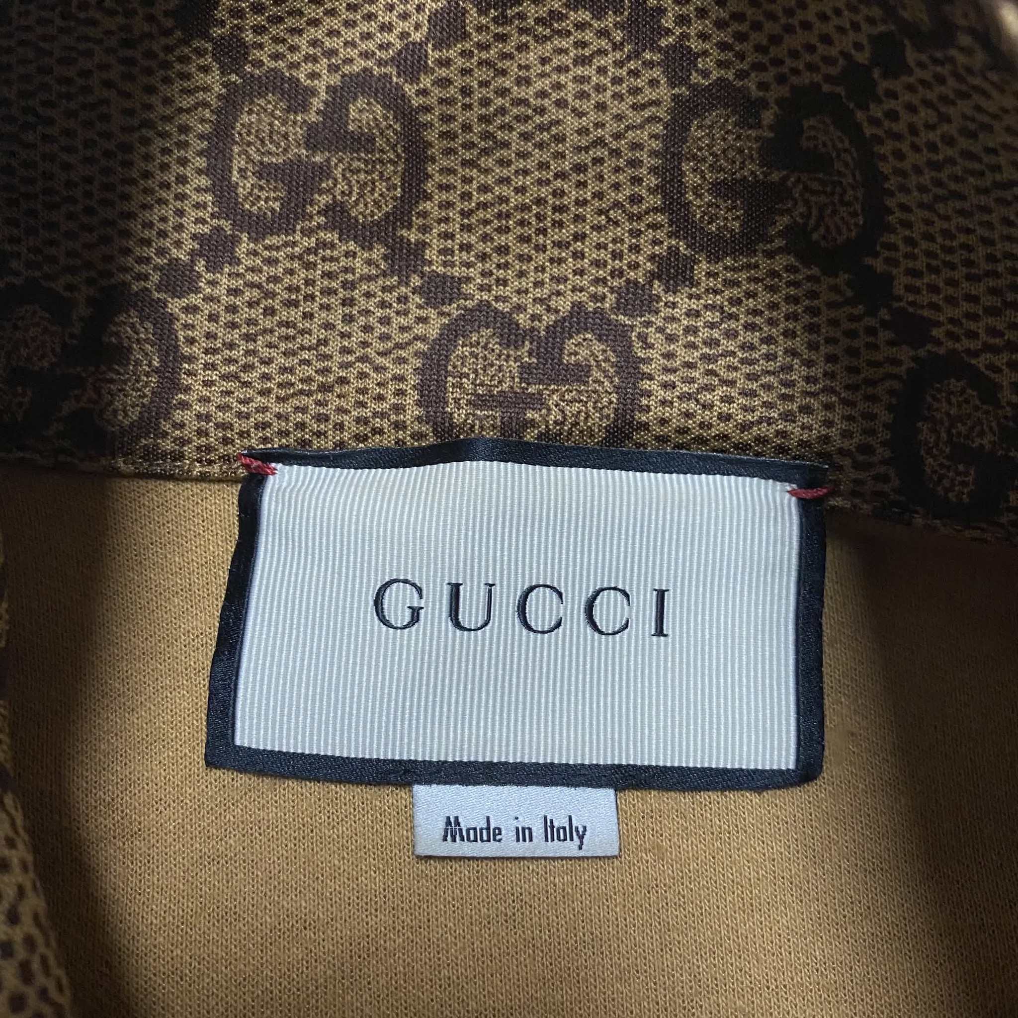 Gucci Full-Monogram Zip-Up Jacket — label