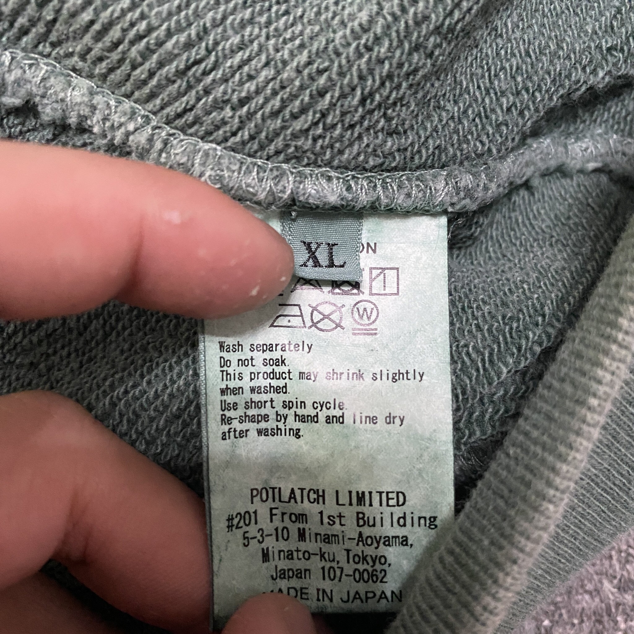 CAVEMPT Half-Zip Washed Sweatshirt Jacket — label
