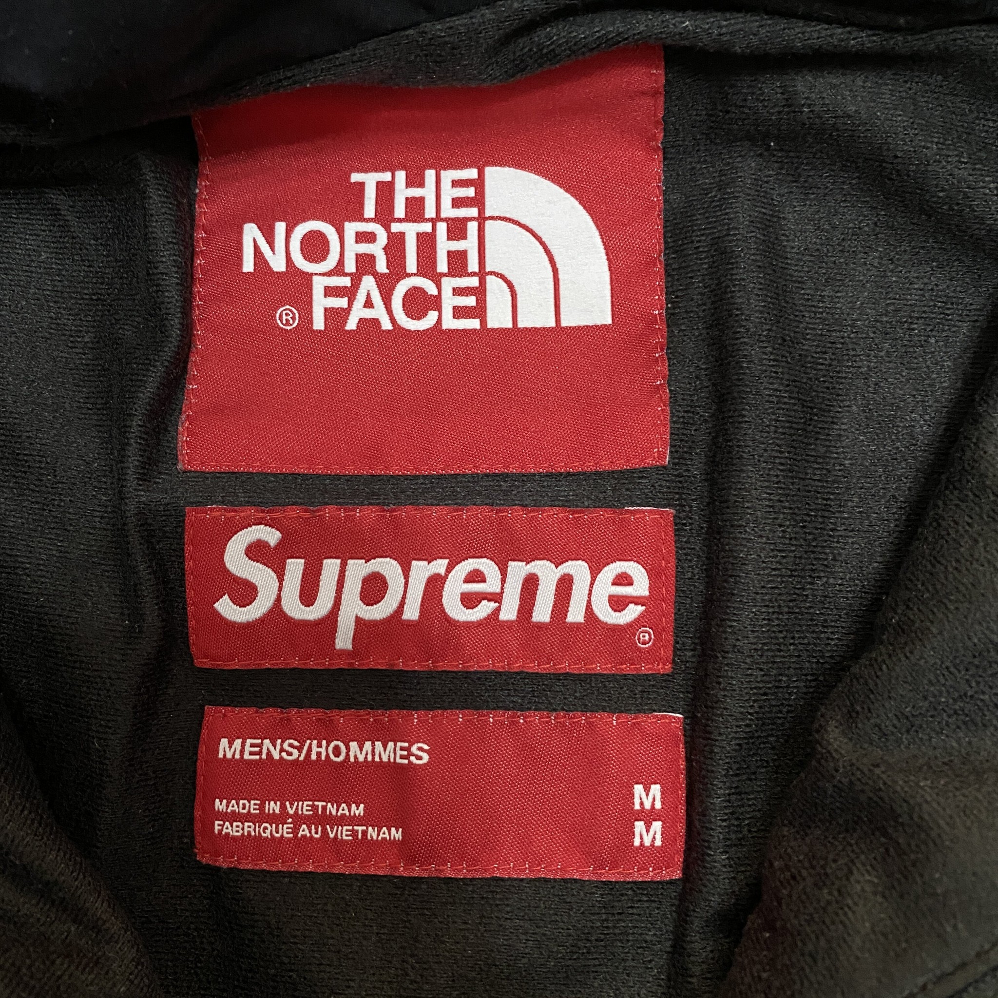 Supreme x TNF Statue of Liberty Jacket — label