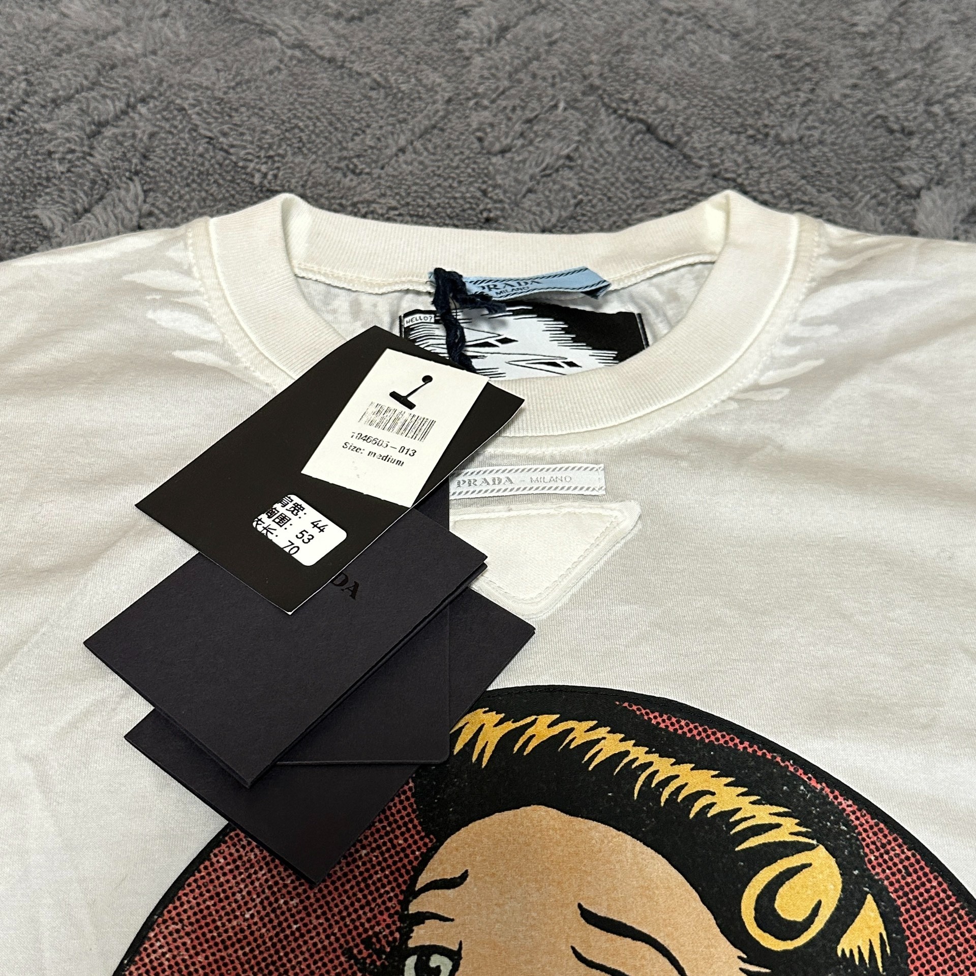 Prada Cartoon Graphic Short Sleeve Tee — back