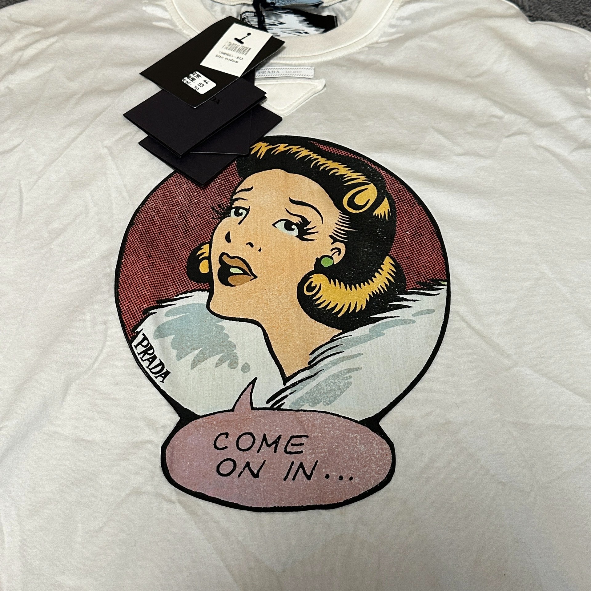 Prada Cartoon Graphic Short Sleeve Tee — detail