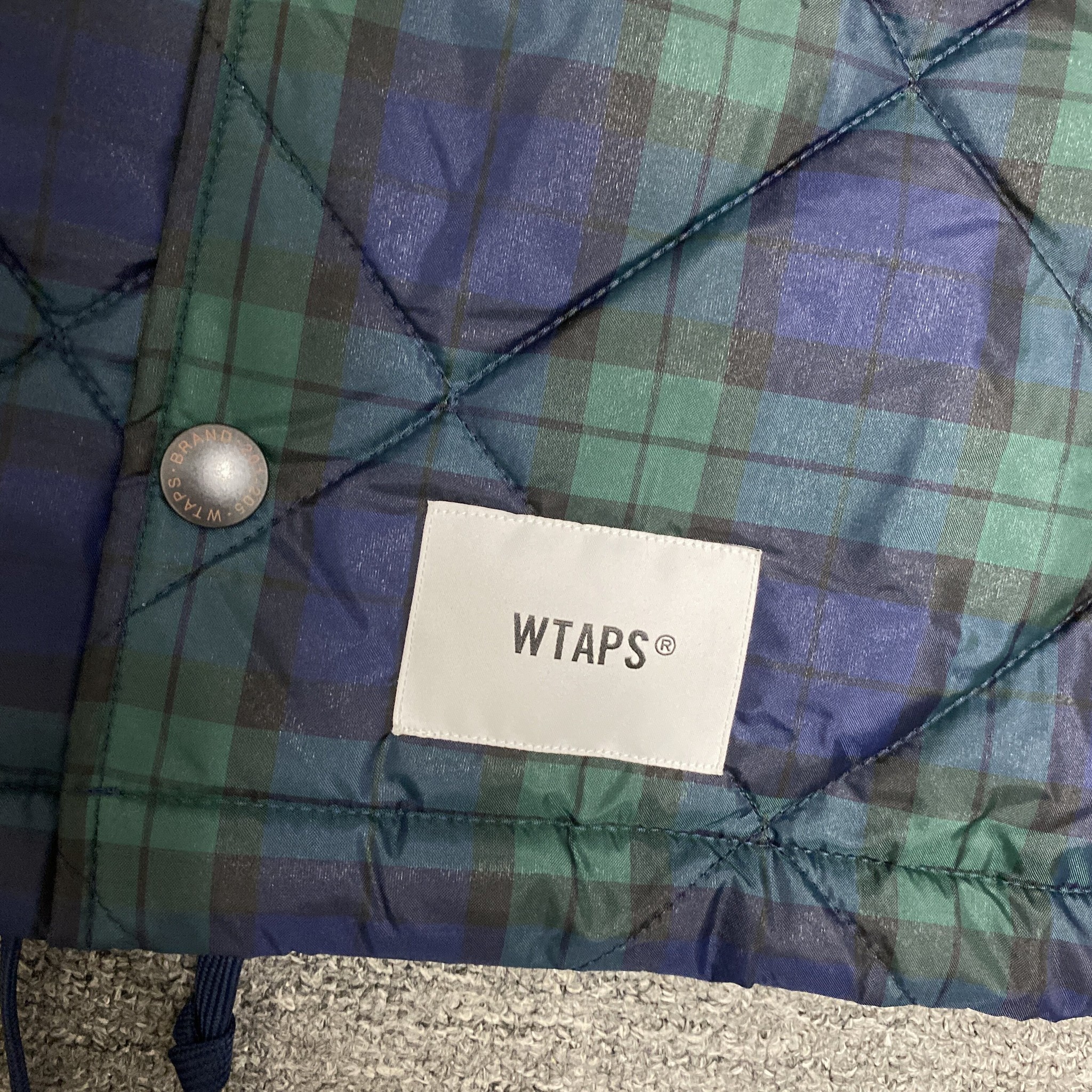WTAPS 22AW Chief Plaid Quilted Jacket — label