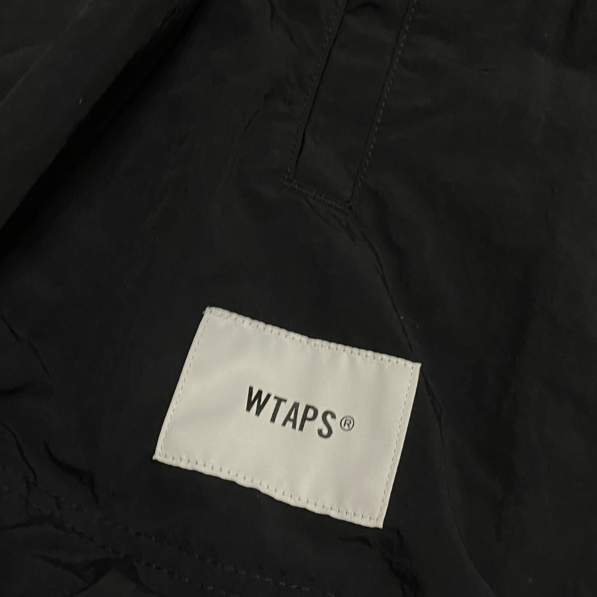 WTAPS 22SS Nylon Pullover Jacket — label