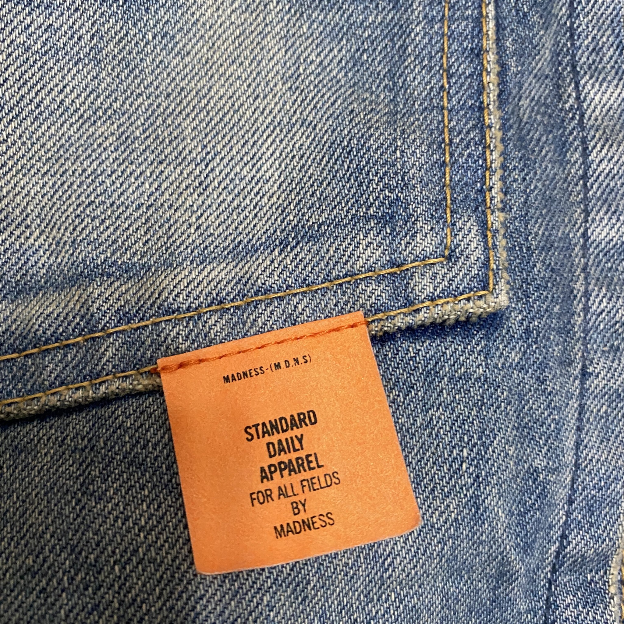 MADNESS 20AW Faded Denim Jacket — label