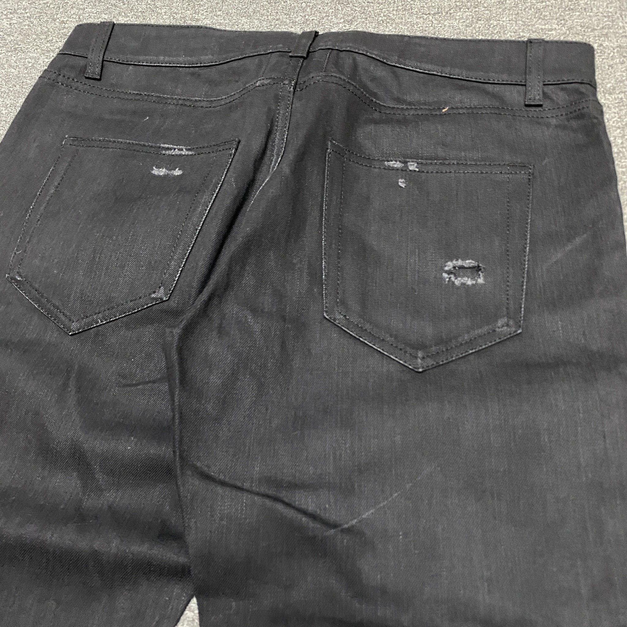 Saint Laurent Distressed Denim Jeans — back