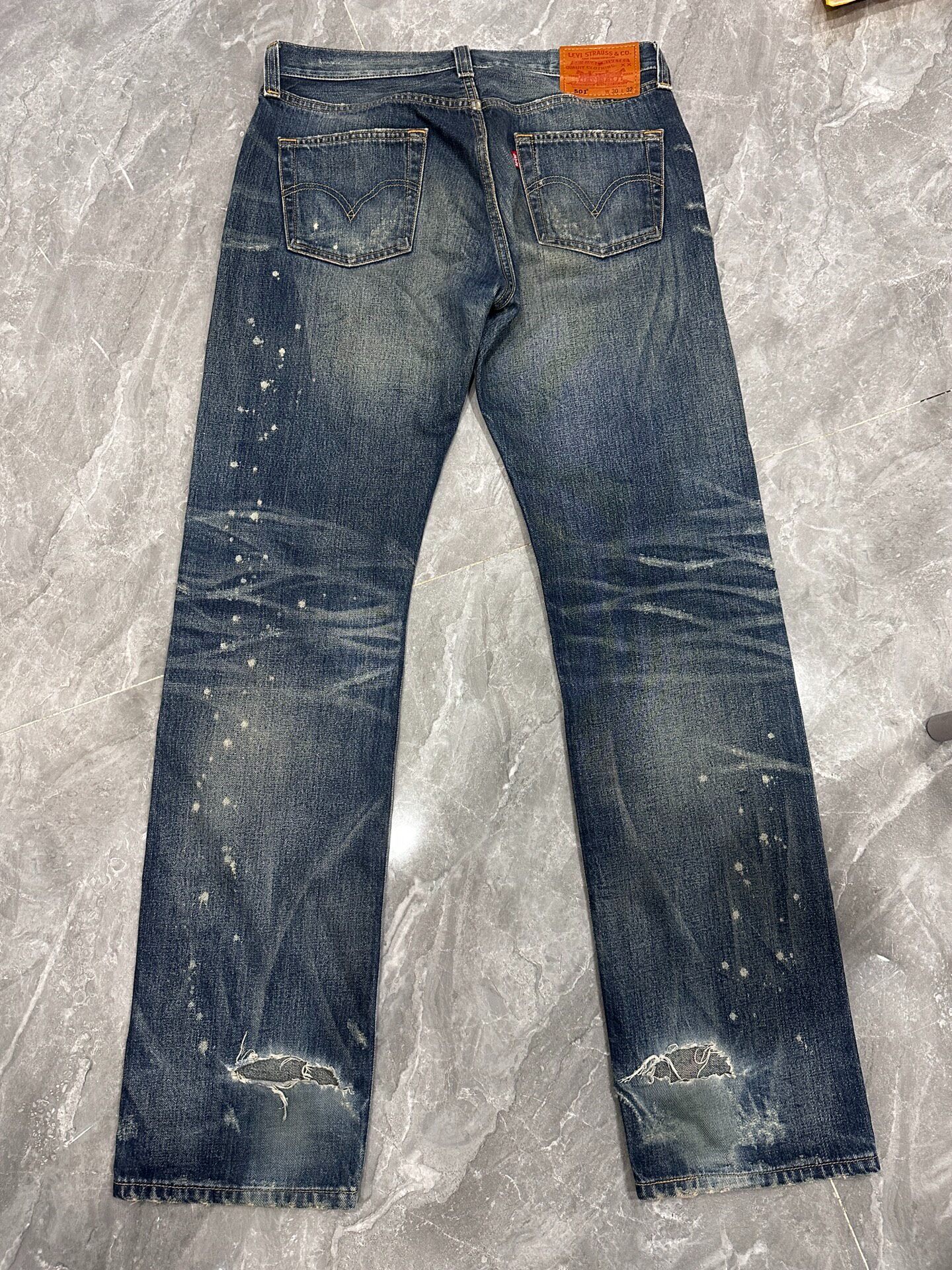 Levi's 501 Distressed Dark Blue Jeans — front