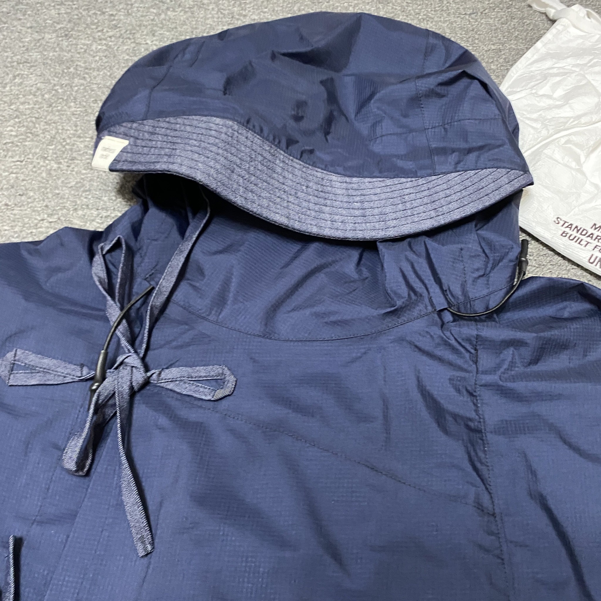MADNESS NORBIT 3-Layer 23AW Windbreaker — detail
