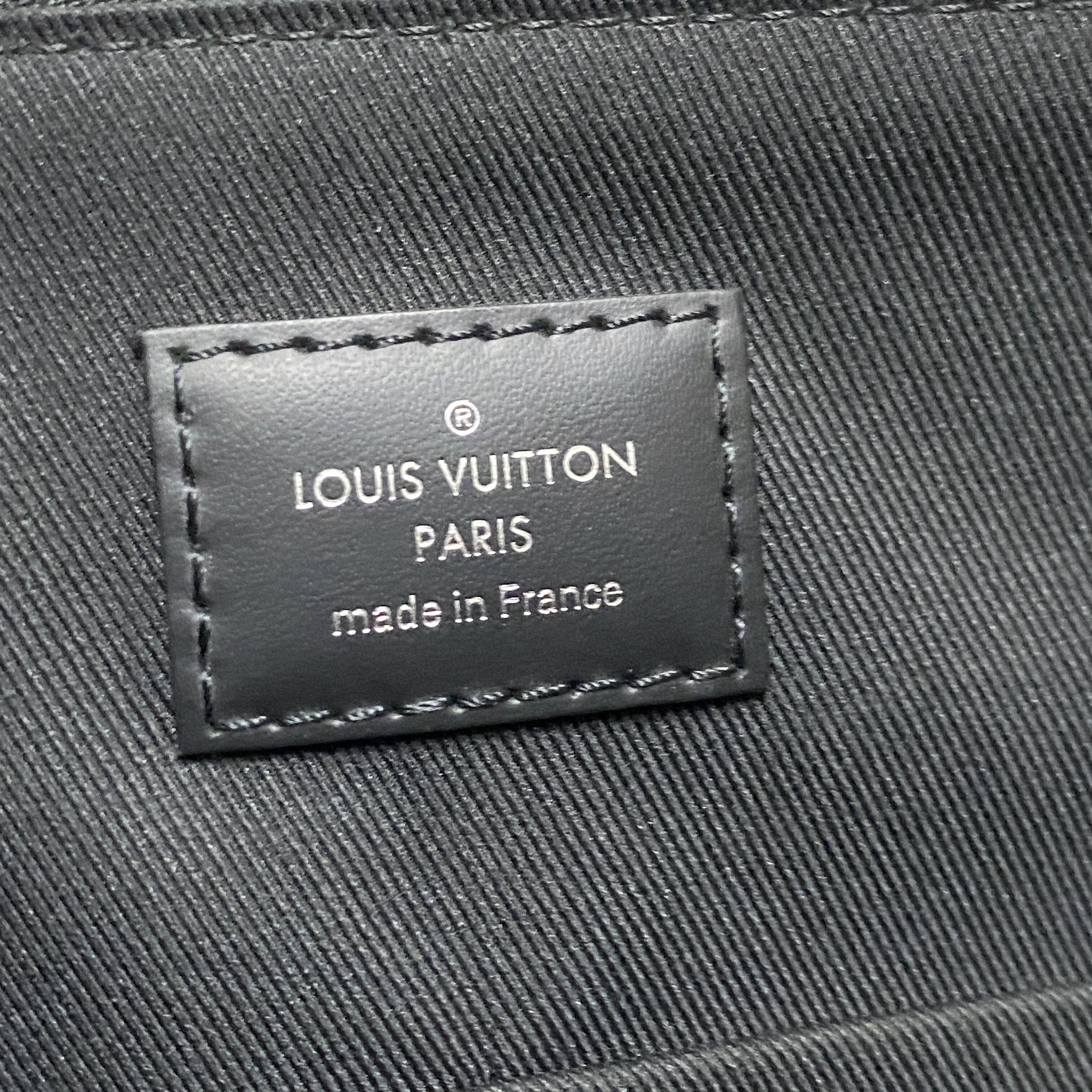 Louis Vuitton Explorer Tote Bag — label